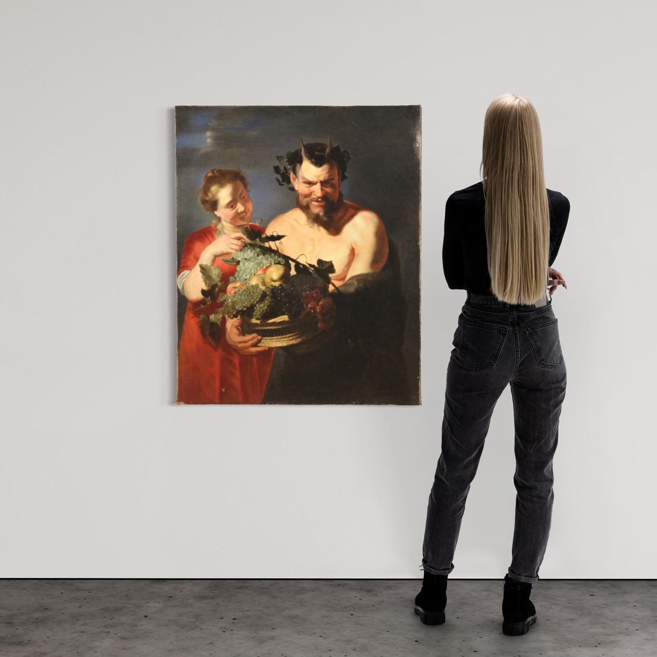 Pintura flamenca de la segunda mitad del siglo XVII. Obra de arte al óleo sobre lienzo que representa un fascinante tema mitológico, Fauno con cesta de frutas y Bacante. Pintura atribuible a un seguidor de Peter Paul Rubens, ya que se trata de una