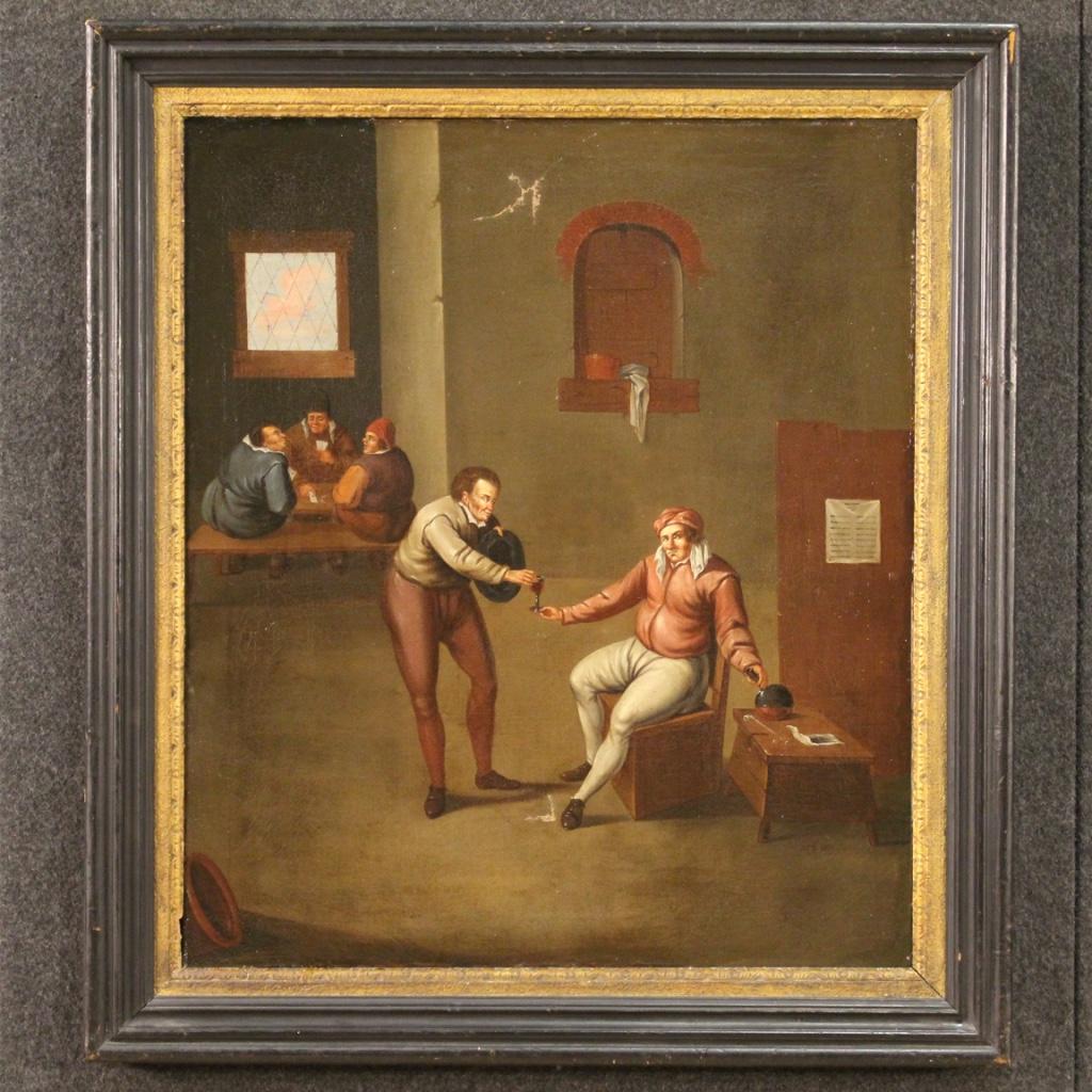 Ancient Flemish painting from the late 17th century. Framework oil on canvas depicting an interior scene of a tavern with characters of good pictorial quality. Painting of good size and pleasant decor for antique dealers, interior decorators and
