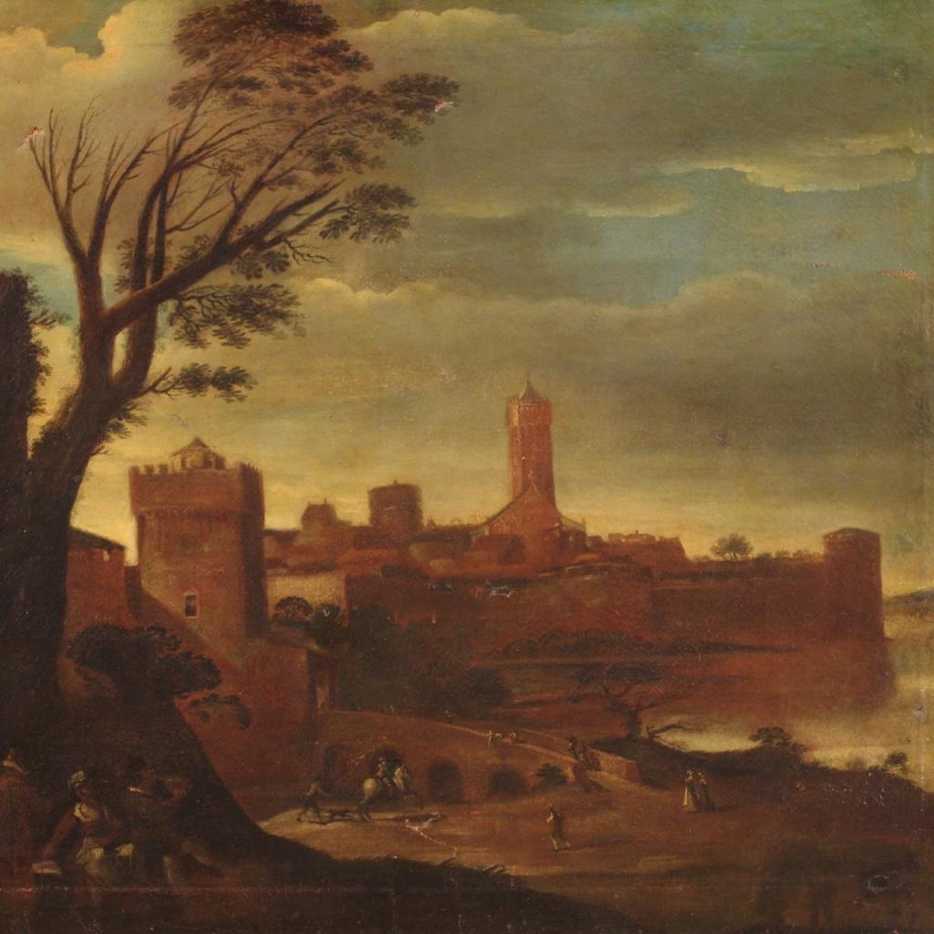 Antique Italian painting from the 17th century. Framework oil on canvas, on the first canvas, depicting an animated landscape with towers of good pictorial quality. Modern frame in carved and gilded wood and plaster of beautiful decoration.