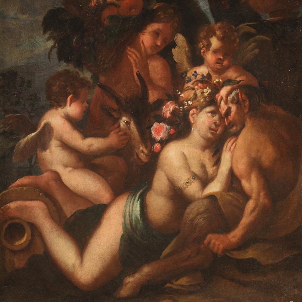 Antique Italian painting from the 17th century. Artwork oil on canvas depicting a mythological subject with nymph, faun and cherubs of excellent pictorial quality. Painting of great size and impact adorned with a non-coeval wooden frame, from the