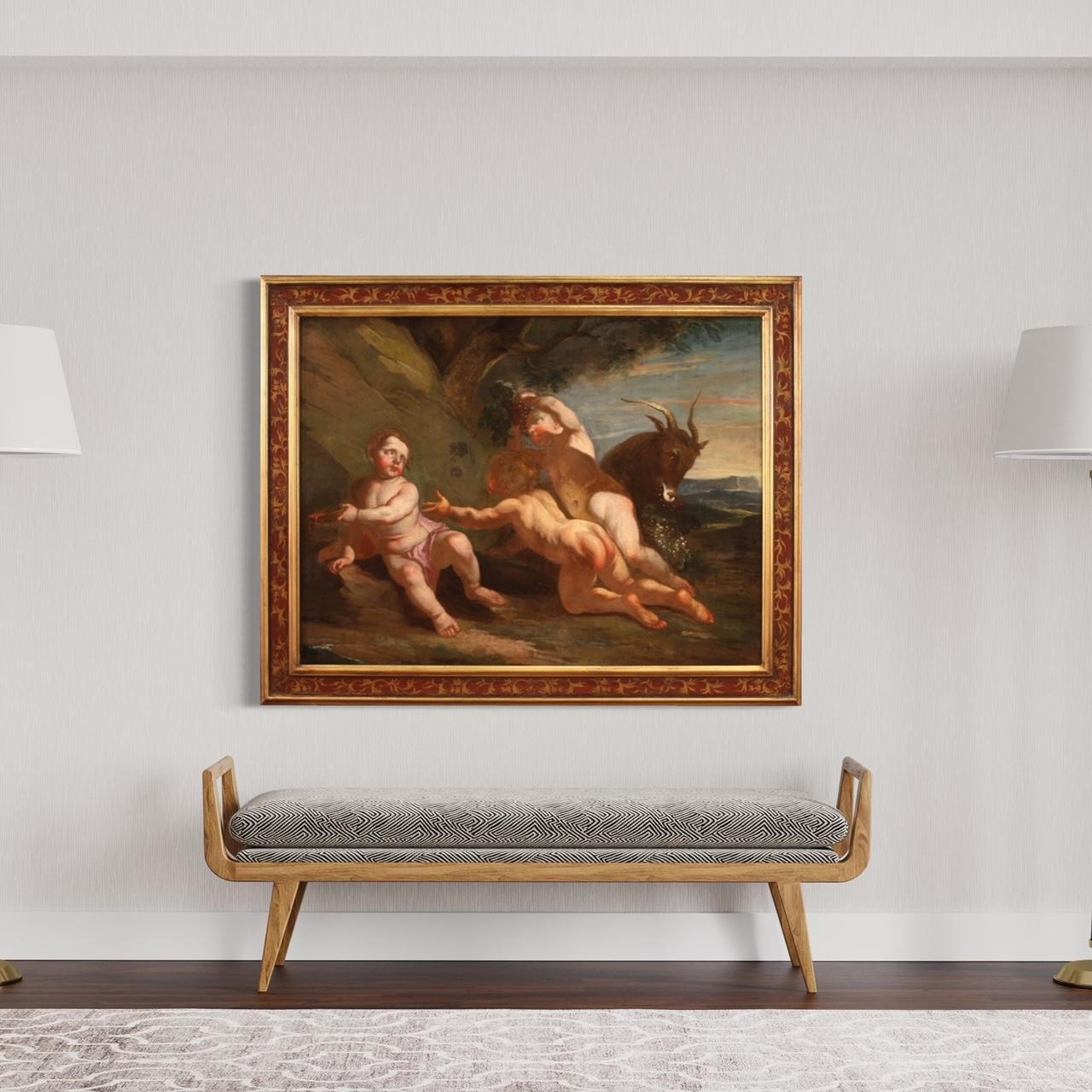 Antico dipinto italiano del XVII secolo. Opera ad olio su tela di scuola napoletana raffigurante Baccanale di putti di eccellente qualità pittorica. Quadro di grande dimensione e impatto impreziosito da una moderna cornice in legno laccato, dorato e