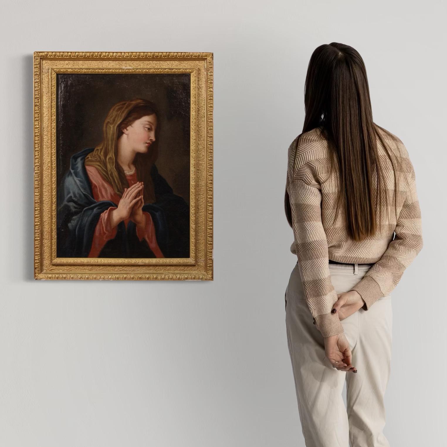 Wonderful Italian painting from the second half of the 17th century. Oil on canvas artwork depicting a splendid Virgin in prayer, a typical devotional representation presumably made for a private client. Painting of notable pictorial quality, in