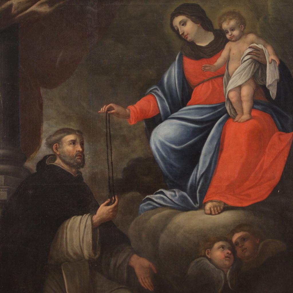 Antique Italian painting from the 17th century. Artwork oil on canvas depicting a religious subject, Delivery of the rosary to Saint Dominic of Guzmán, of good pictorial quality.
Painting equipped with a small wooden frame applied to the side of