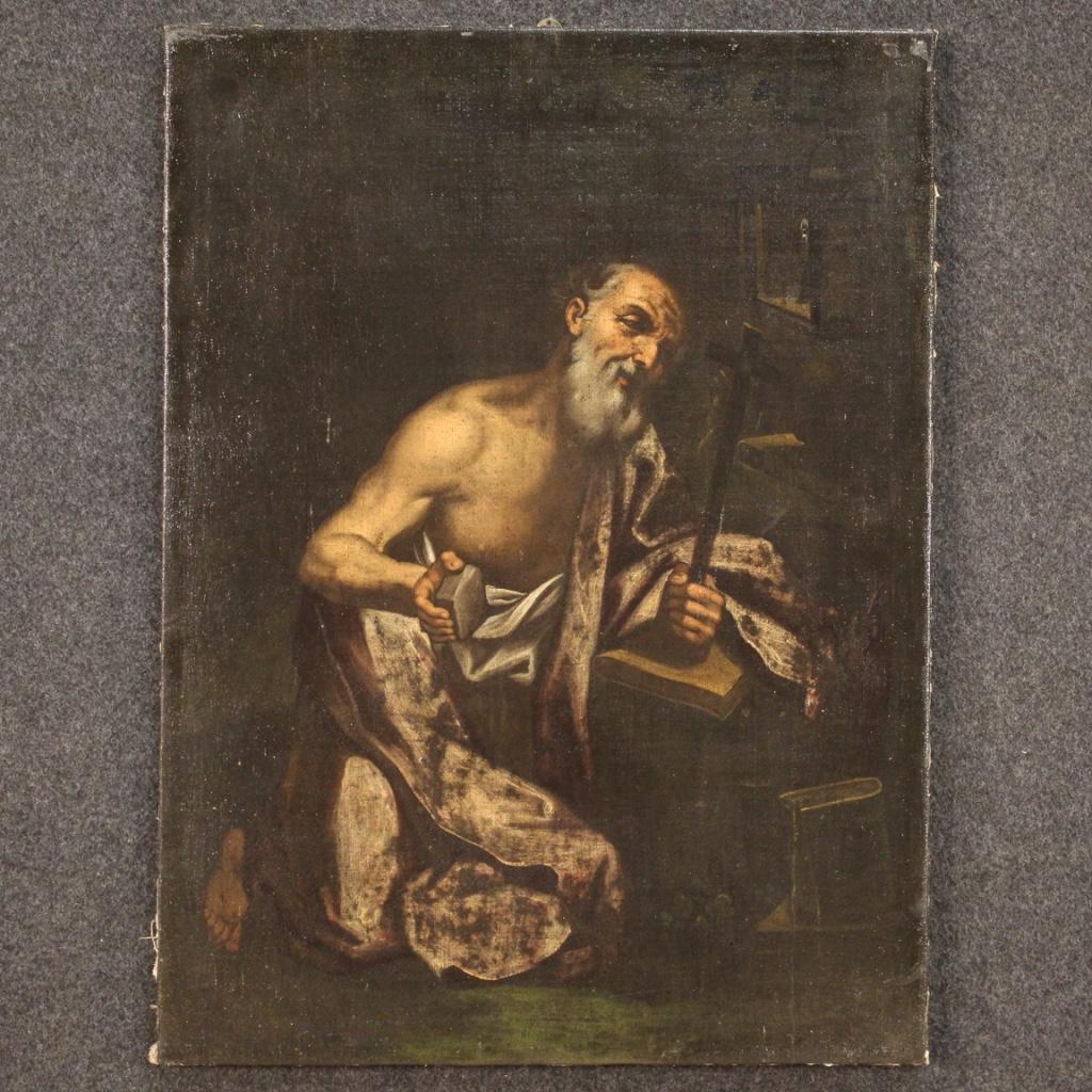 Antique Italian painting from the 17th century. Framework oil on canvas depicting a religious subject Saint Jerome of good pictorial quality. A painting with a dark background rich in decorative elements and of great pictorial intensity. Work that