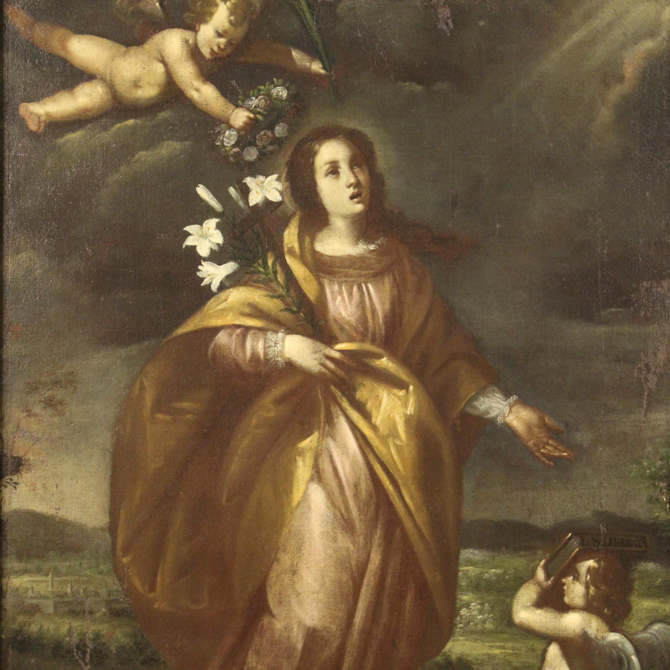 Antique Italian painting from the late 17th century. Oil on canvas framework depicting a religious subject Saint Liberata with cherubs of good pictorial quality. Painting rich in decorative elements, of interesting perspective with a view of the