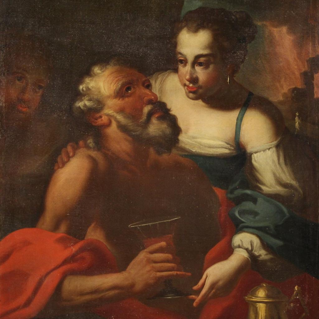 Antique 17th-century Italian painting. Oil on canvas artwork depicting the famous biblical story of Lot and his daughters. After the destruction of Sodom and Gomorrah, Lot takes refuge with his daughters in a cave. The girls, fearing the end of