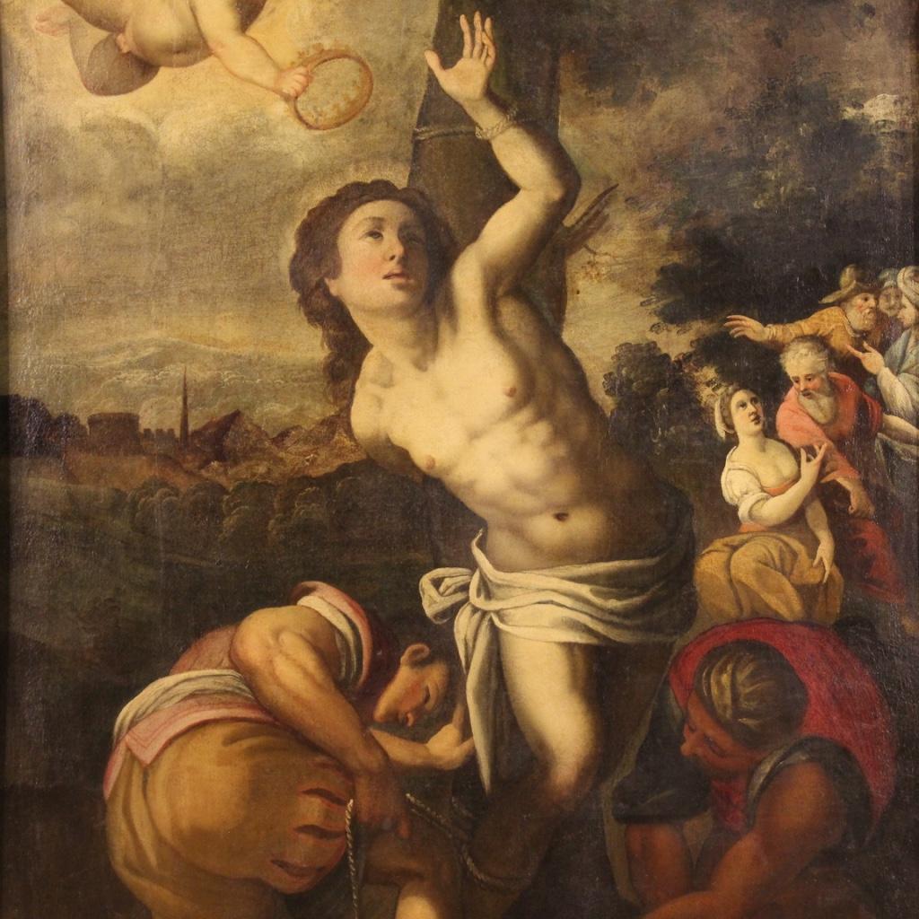 Antique Italian painting from the 17th century. Framework oil on canvas depicting the religious subject of Saint Sebastian of excellent pictorial quality. An interesting perspective painting, rich in characters and decorative elements, for antique