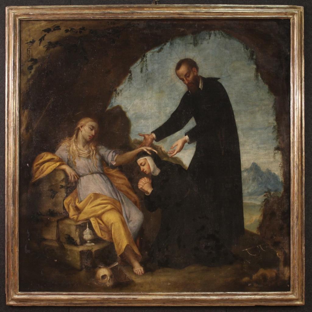 Antique Italian painting from the second half of the 17th century. Oil on canvas artwork depicting a religious subject Magdalene with Sister Orsolina in prayer and Saint Jerome Emiliani inside a cave. Painting of great measure and impact adorned by