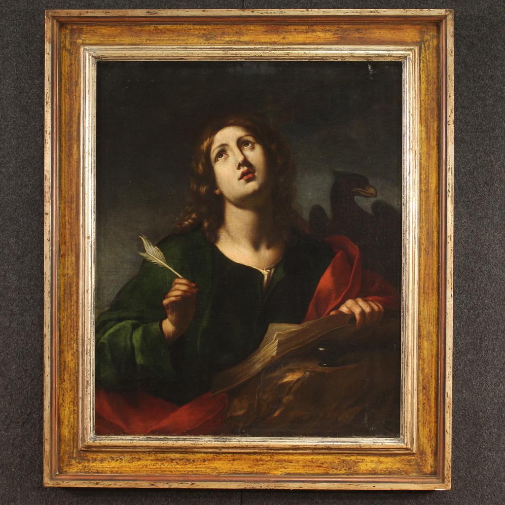 Antique Italian painting from the late 17th century, early 18th century. Artwork oil on canvas depicting a religious subject of St. John the Evangelist of excellent pictorial quality. According to the iconography, the Saint is represented with a