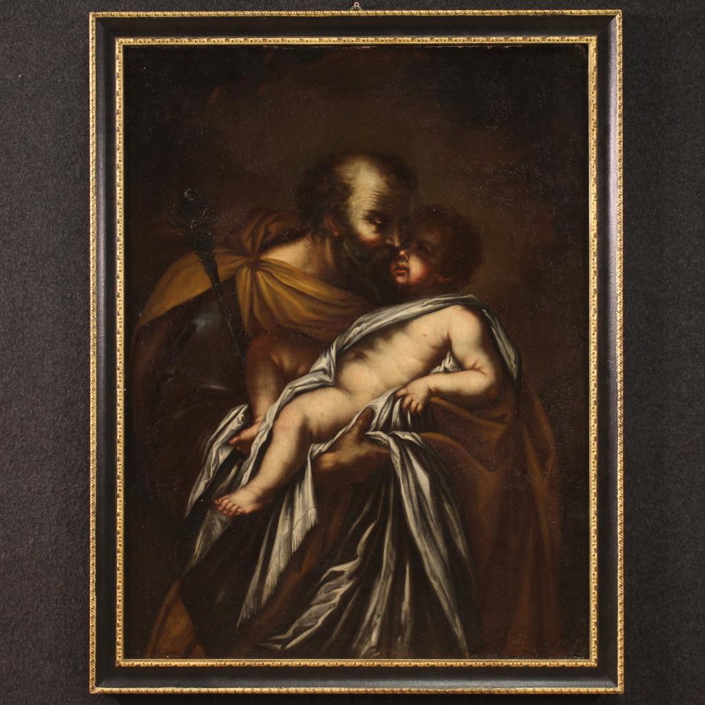 Antique Italian painting from the 17th century. Artwork oil on canvas depicting a religious subject St. Joseph with child of excellent pictorial quality. Painting of large size and pleasant furnishings adorned with a non-coeval frame, from the 20th