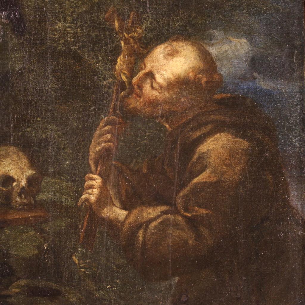 Antique Spanish painting from the second half of the 17th century. Oil on canvas artwork depicting Saint Francis, of good pictorial quality. The painting is adorned with a beautiful 19th-century carved and gilded wooden frame. A small artwork, ideal