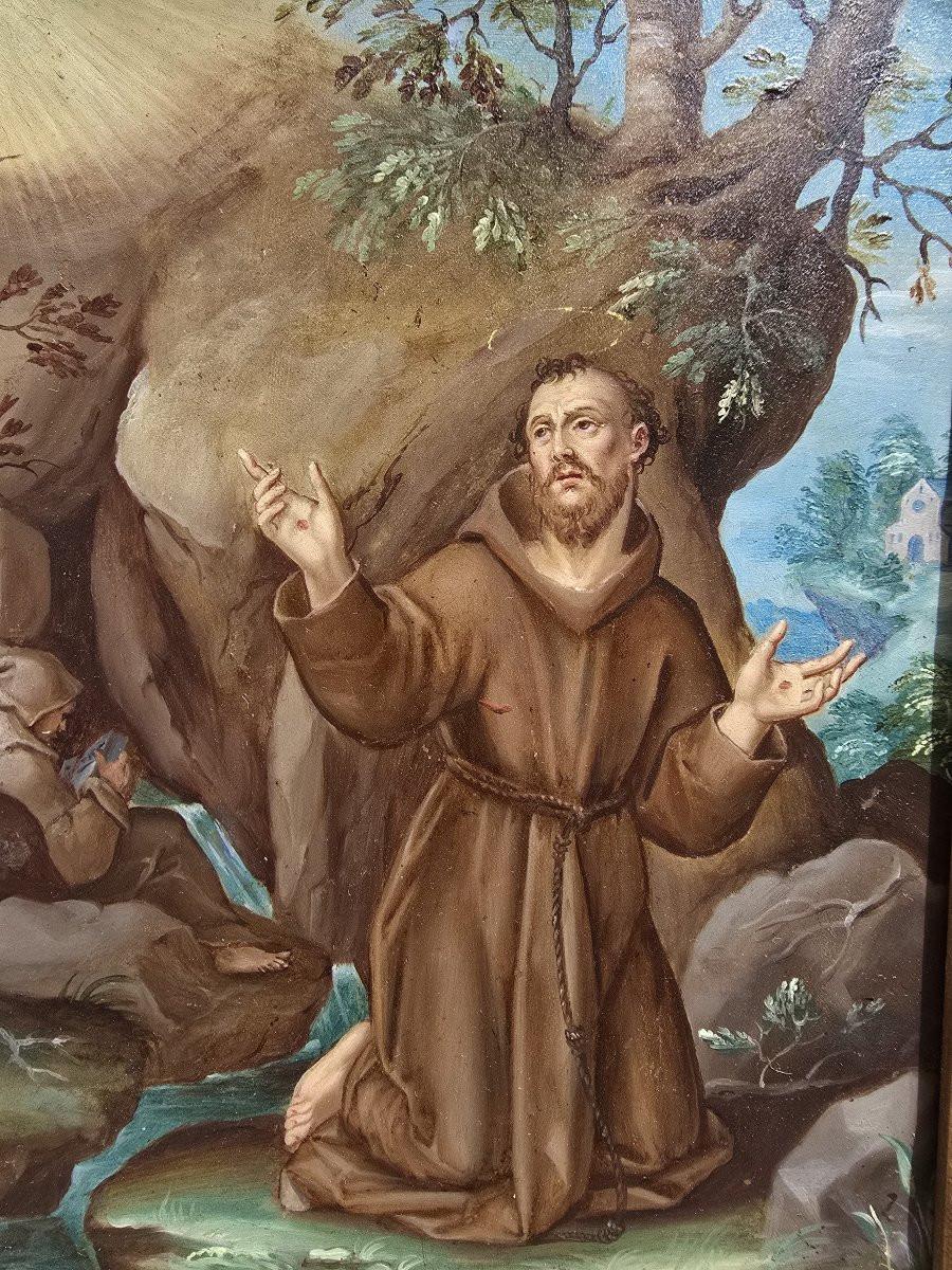 Ein außergewöhnliches und intimes Ölgemälde aus dem 17. Jahrhundert, das den heiligen Franz von Assisi in einem tiefen Moment der spirituellen Kontemplation darstellt. Dieses mit meisterhafter Technik gestaltete Andachtsbild zeigt den Heiligen