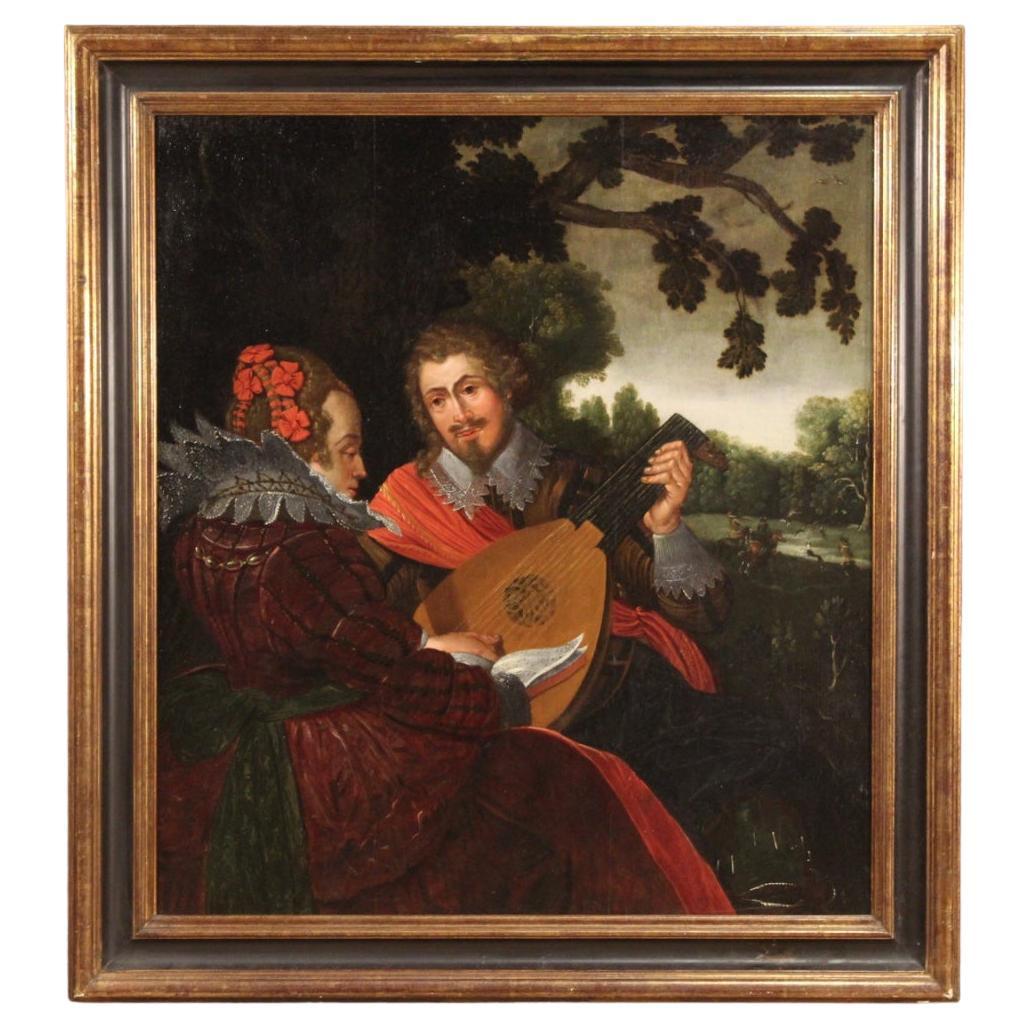 Antique Flemish painting from the second half of the 17th century. Oil on oak panel depicting Musicians, elegant duet with lute player and hunting scene in the background. Note the refinement of the clothes and the meticulous details typical of the