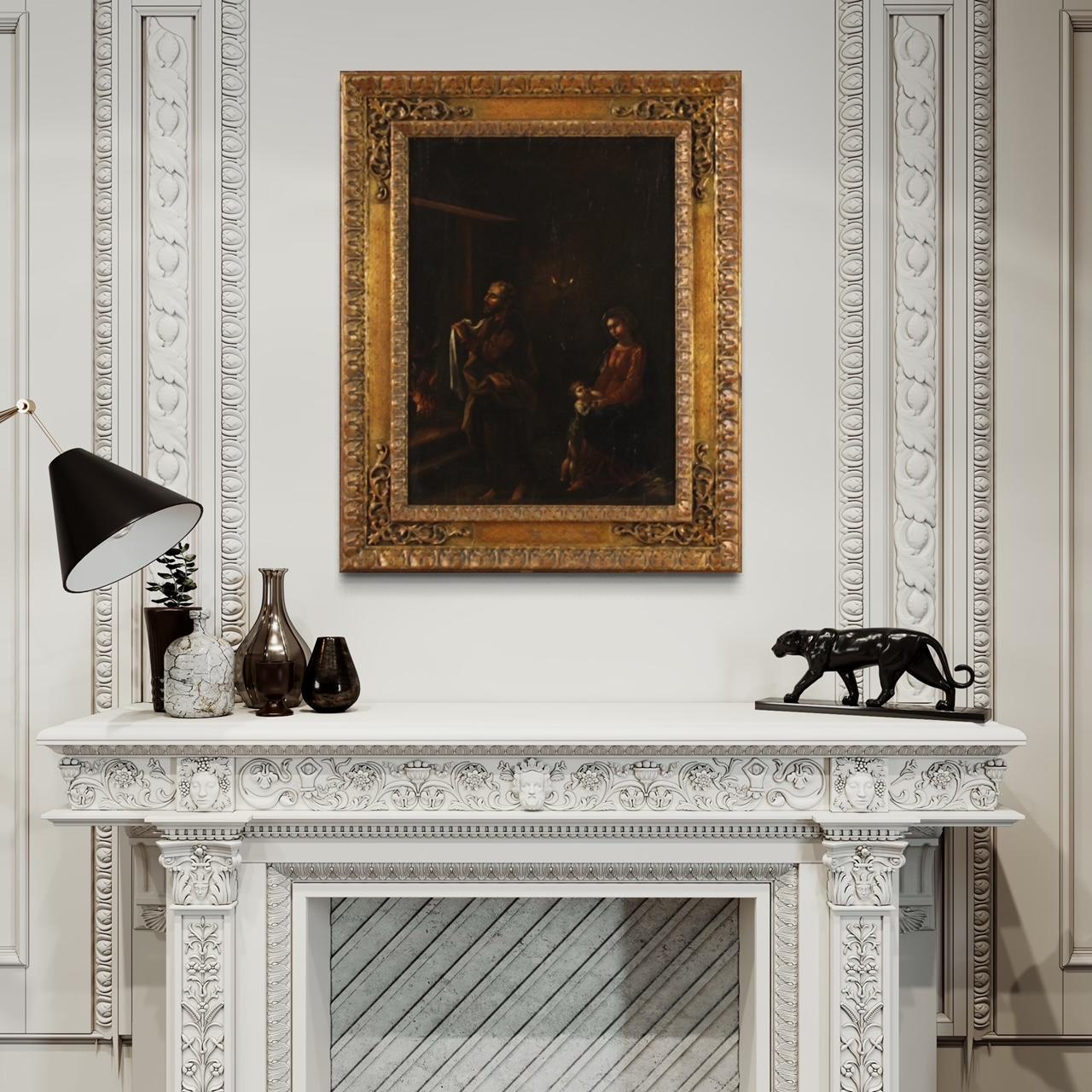 Antique Flemish panel from the second half of the 17th century. Oil artwork on panel depicting a religious subject with an interior scene with the Holy Family of good pictorial quality. 20th century frame, in wood and plaster, finely carved and