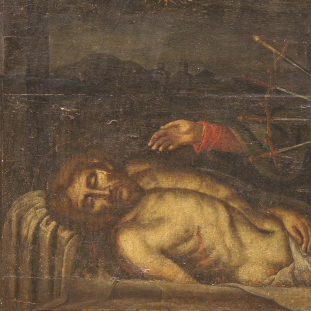 Ancient Italian painting from the 17th century. Oil on panel framework of exceptional size depicting a subject of sacred art Dead Christ with Our Lady of Sorrows of good pictorial quality. Painting of great measure and impact, for antique dealers,