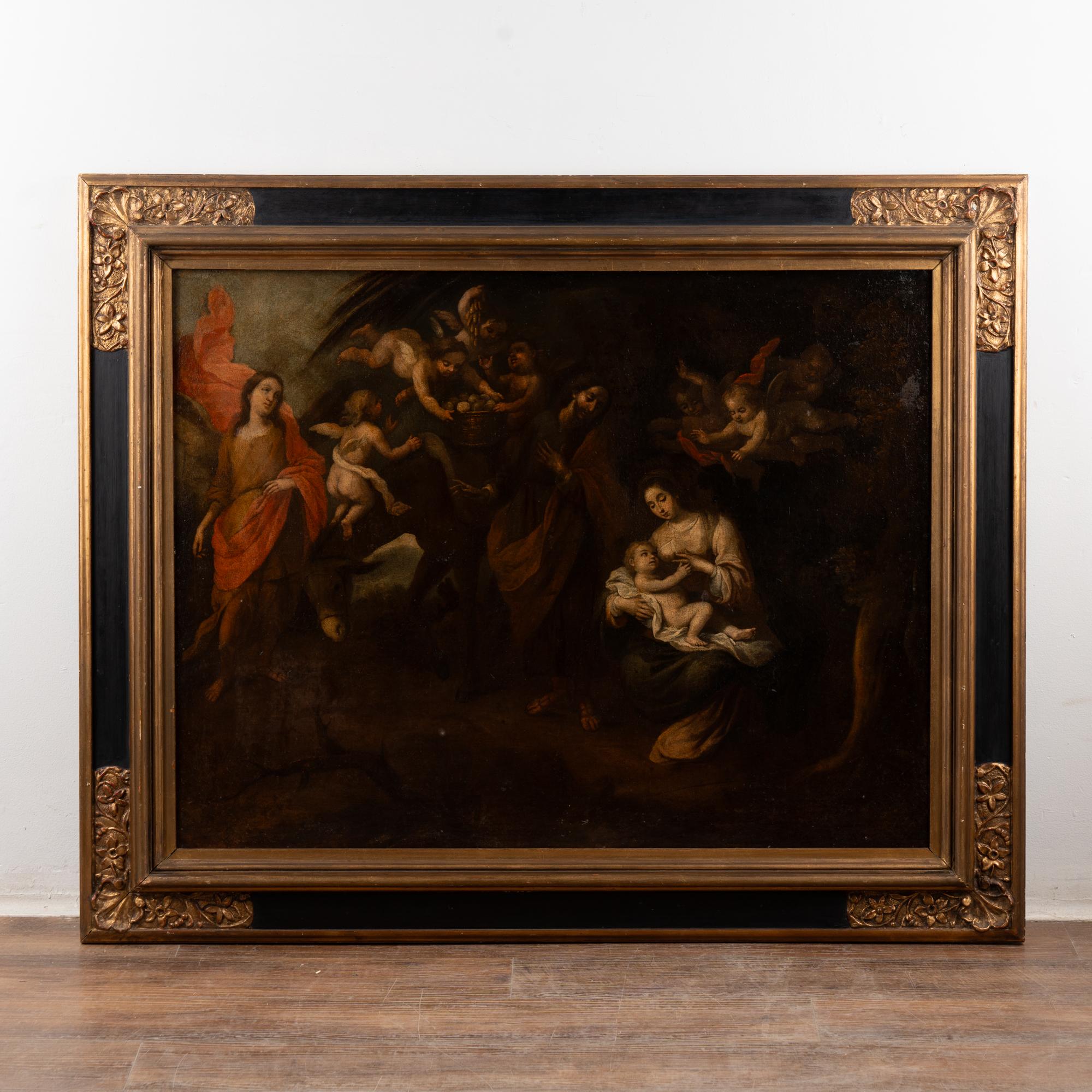 Original oil on canvas painting of The Flight into Egypt with Mary and Christ child.
Spanish School, Seville, 17th Century.
Relined canvas. Age related craquelure throughout.  Painting will benefit from a surface cleaning which we leave to