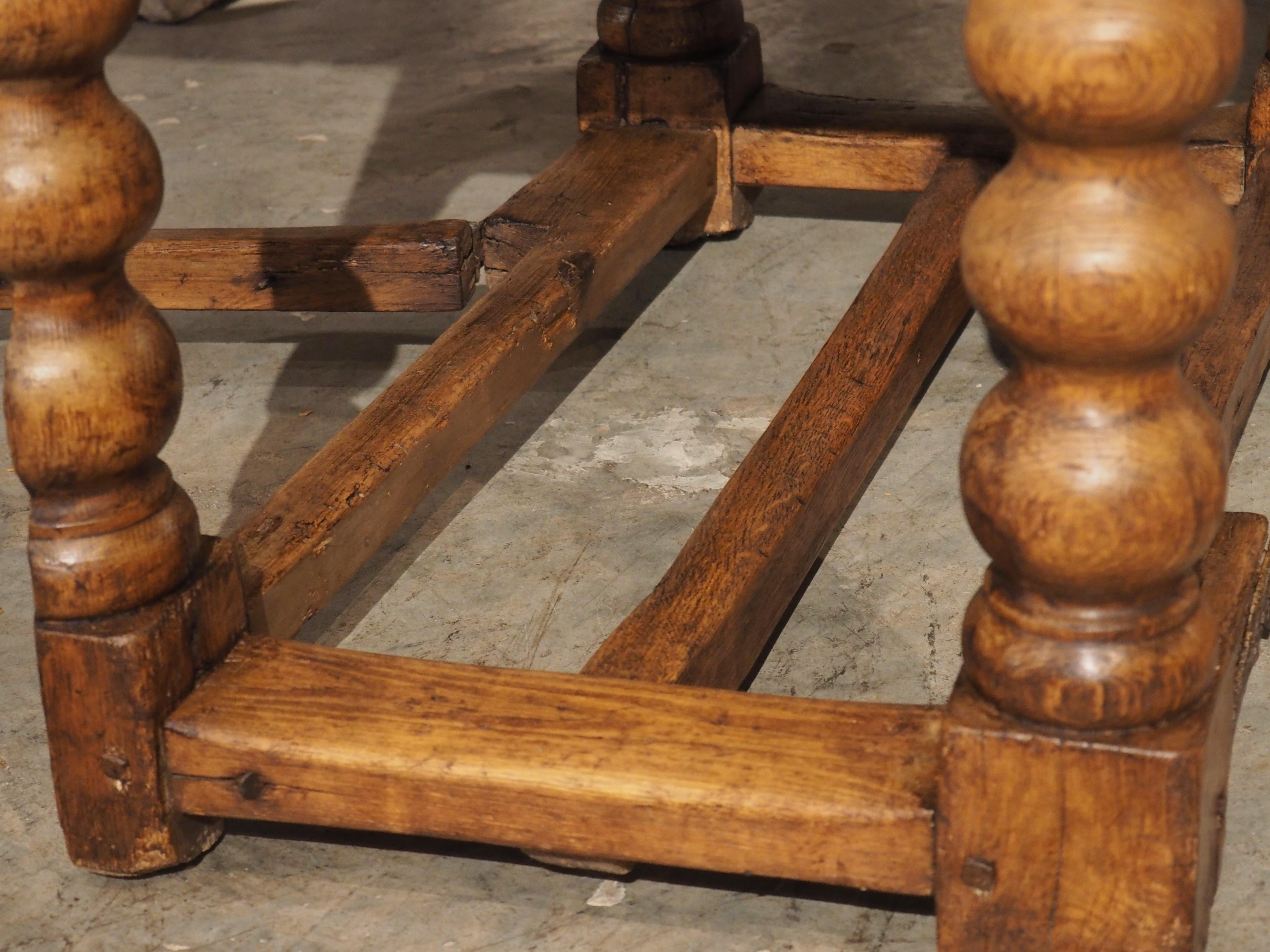 First introduced in England during the 16th century, a gate leg table is a small table that has drop leaves supported by pivoting legs. These legs are supported by a stretcher at the top and bottom, forming a stylized gate. Our oval gate leg table