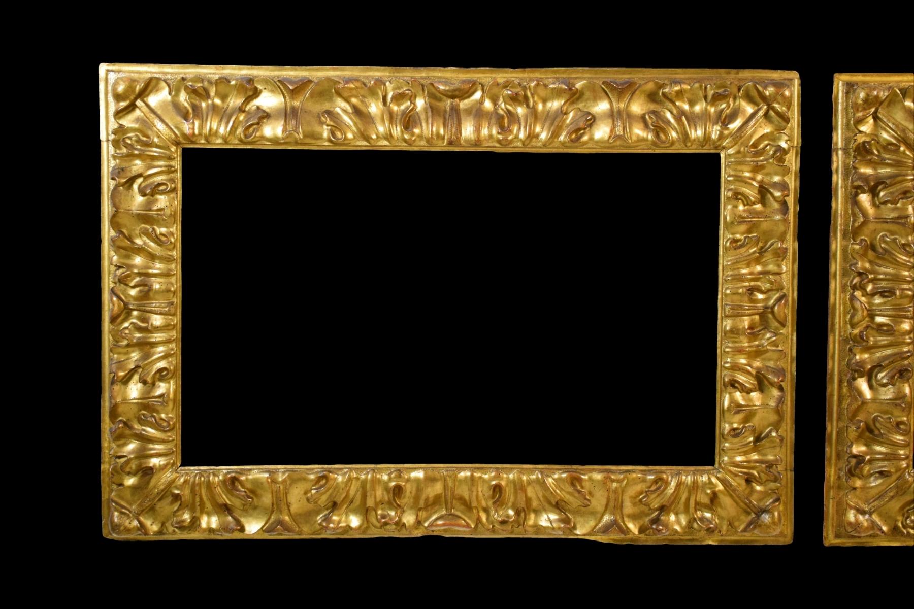 17th century, pair of Italian carved giltwood frames
Total sizes H 86 x W 125 cm; inside space H 56 x W 94.5 cm

This important pair of frames was made in the second half of the 17th century in Bologna, (Italy). The rectangular frames are made of