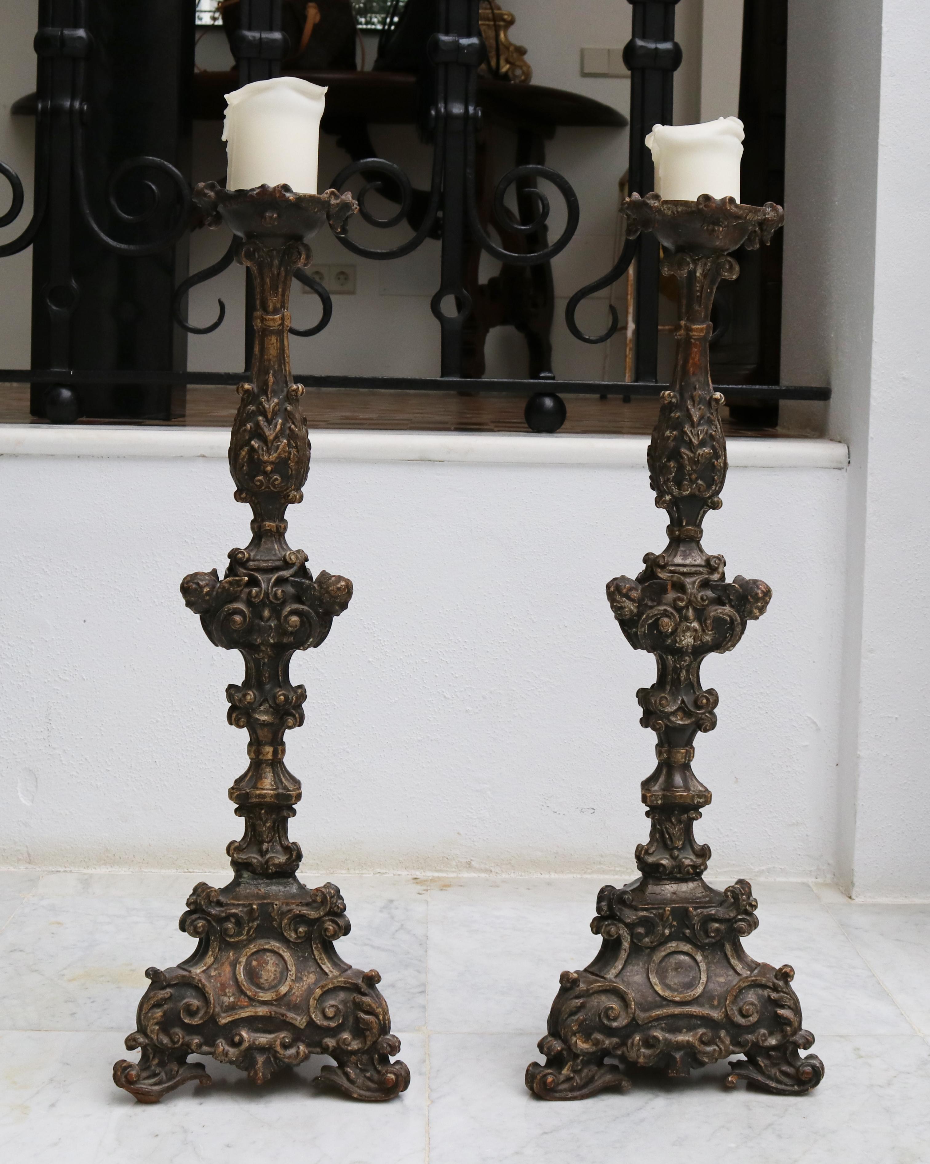 17th century pair of Italian wooden pricket sticks.