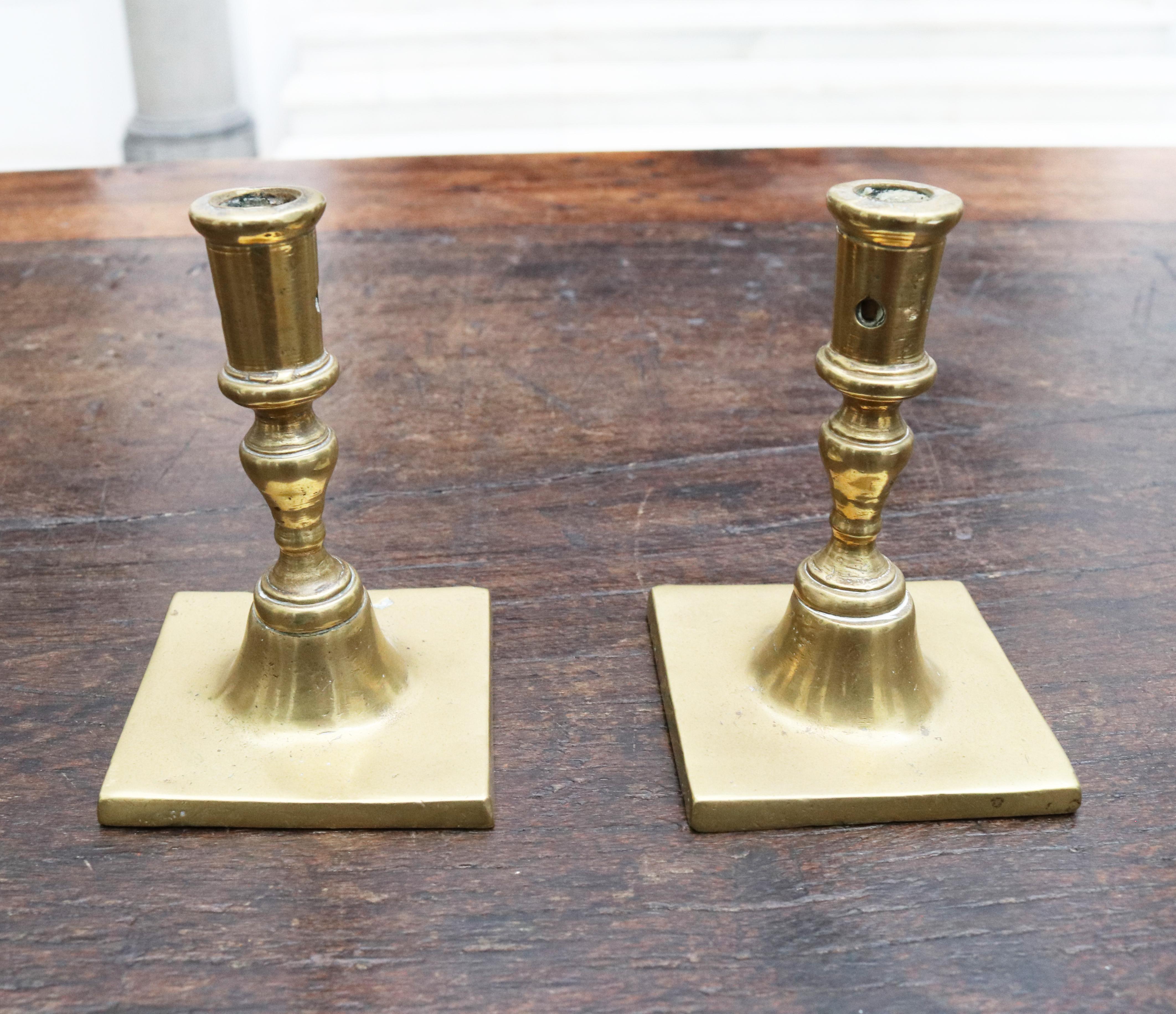 17th century pair of Spanish brass candlesticks.