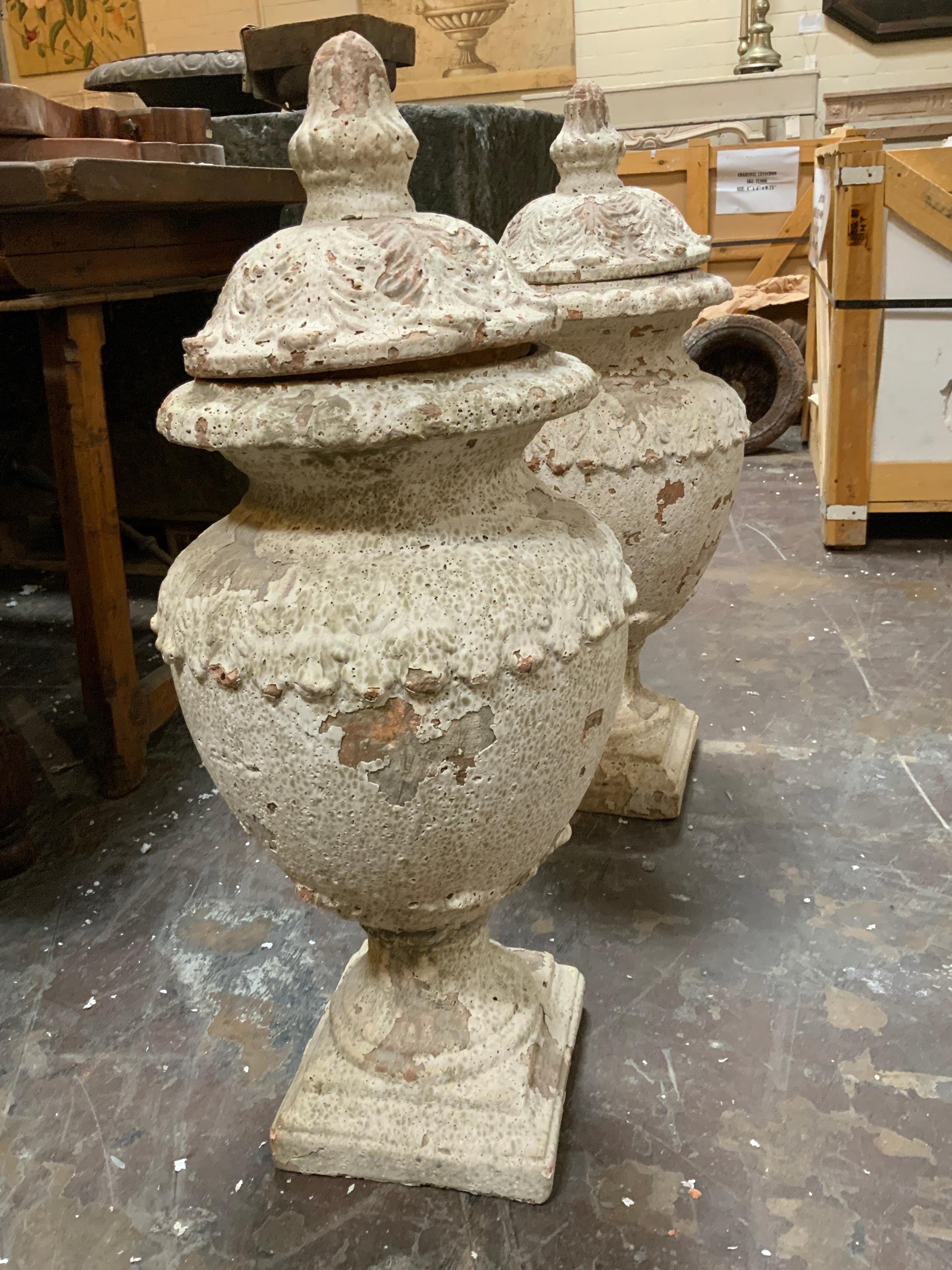 Eye-catching terracotta urns, originates from France. Items are sold as a pair.