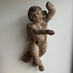 17th Century Polychrome Carved Wooden Cherub