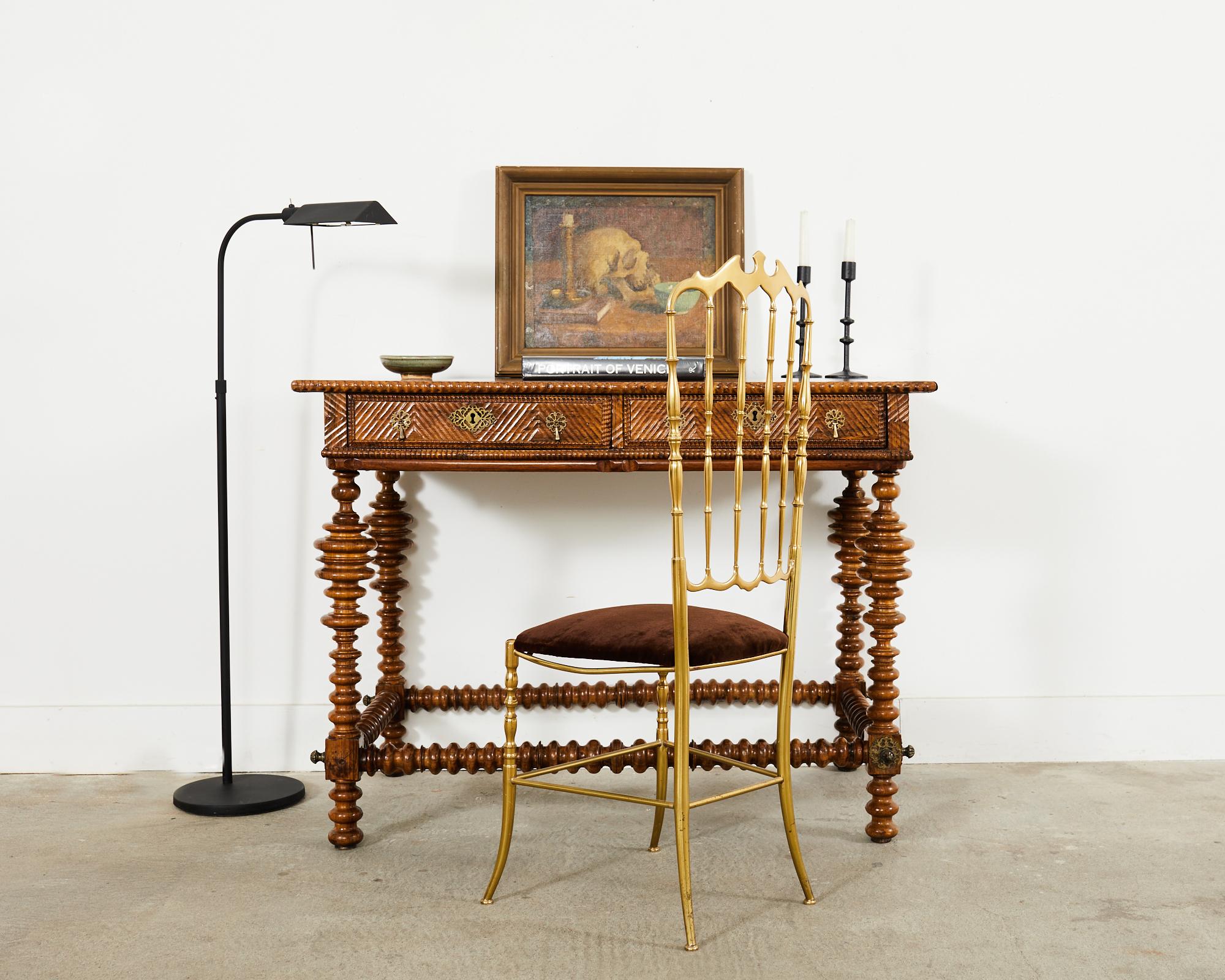 Extraordinary late 17th century baroque period Portuguese library table, center table, or writing table crafted from radiant Brazilian Rosewood. The mesa bufete has a rectangular top with a decorative gadrooned edge. The desk is fronted by two