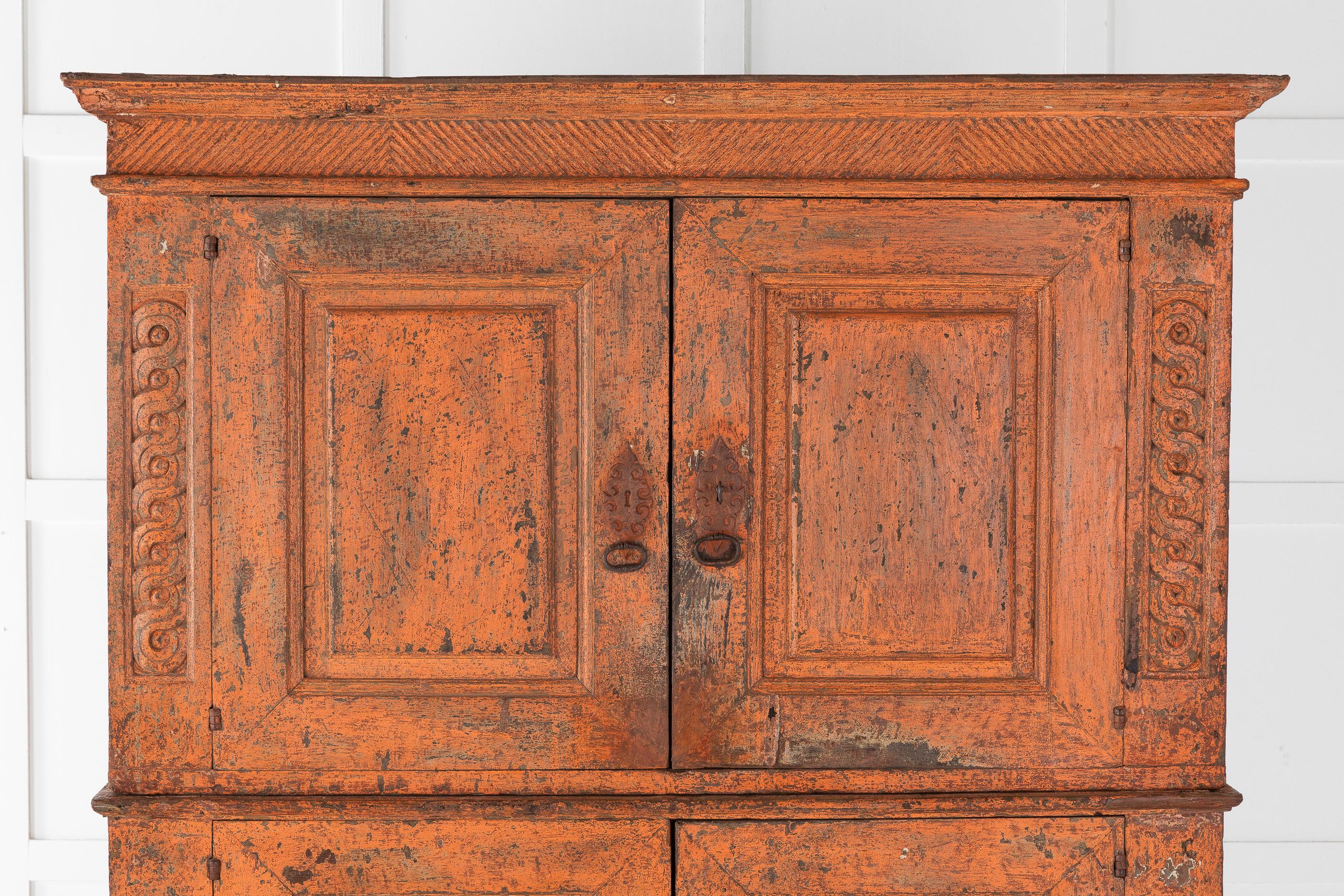 A rare find! 17th century Portuguese cabinet of small proportion.

We have carefully taken the 18th and 19th century paint off to reveal the original 17th century paint.

This cabinet has four doors, with a simple carved pattern, that open into