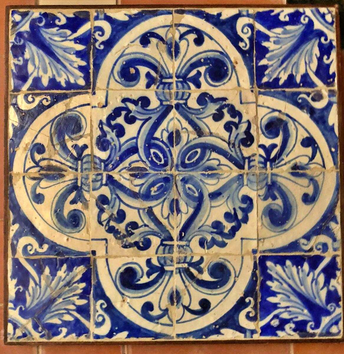 17th Century Portuguese tile panel.
Restored
56cm x 56cm
14cm x 14cm tiles

17th Century

Shortly afterwards, these plain white tiles were replaced by polychrome tiles (enxaquetado rico) often giving a complex framework such as in the Igreja