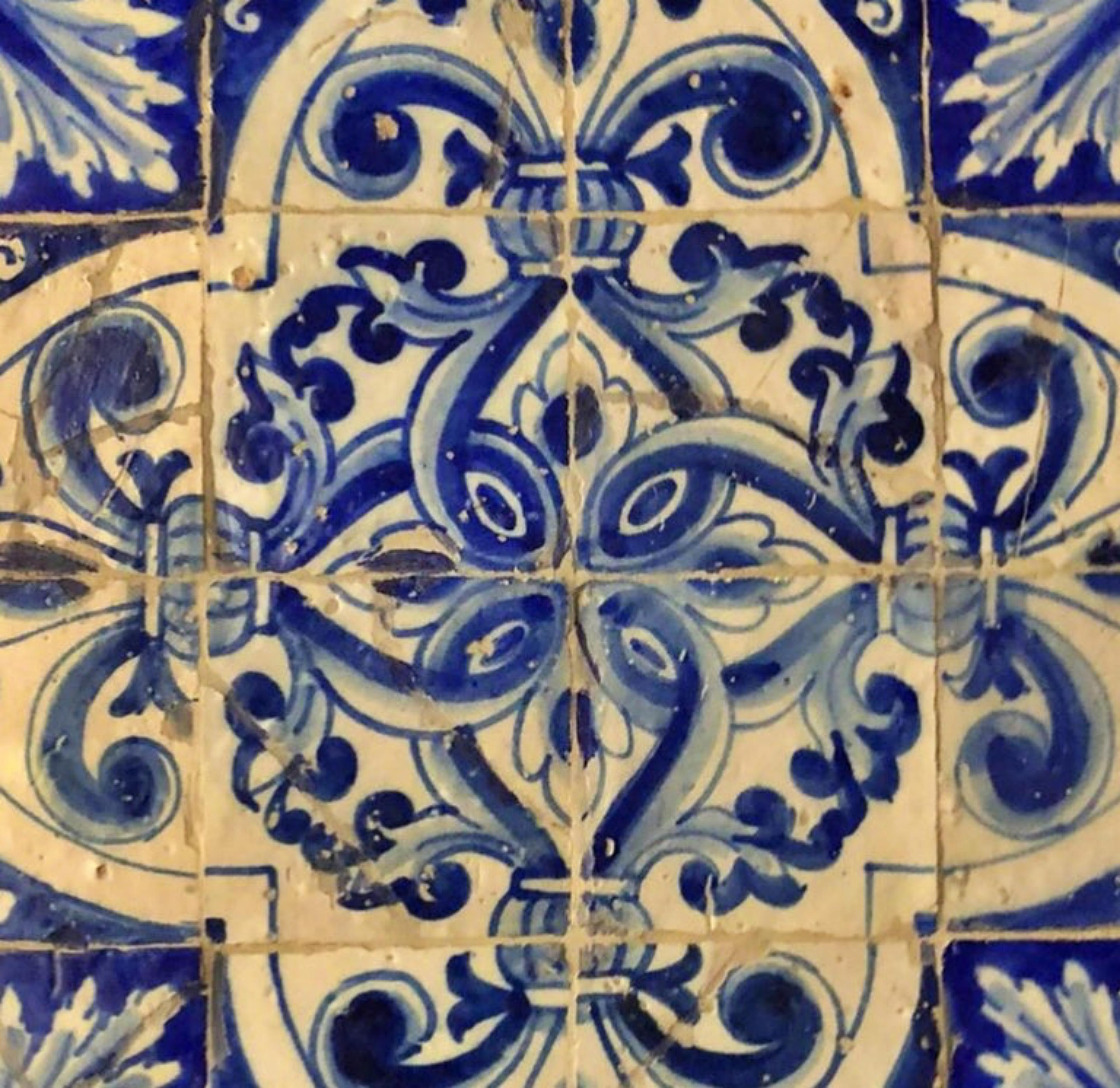 Largest collection of Portuguese tiles in the world
17th Century Portuguese tile panel.
Restored
56cm x 56cm
14cm x 14cm tiles

17th Century

Shortly afterwards, these plain white tiles were replaced by polychrome tiles (enxaquetado rico) often