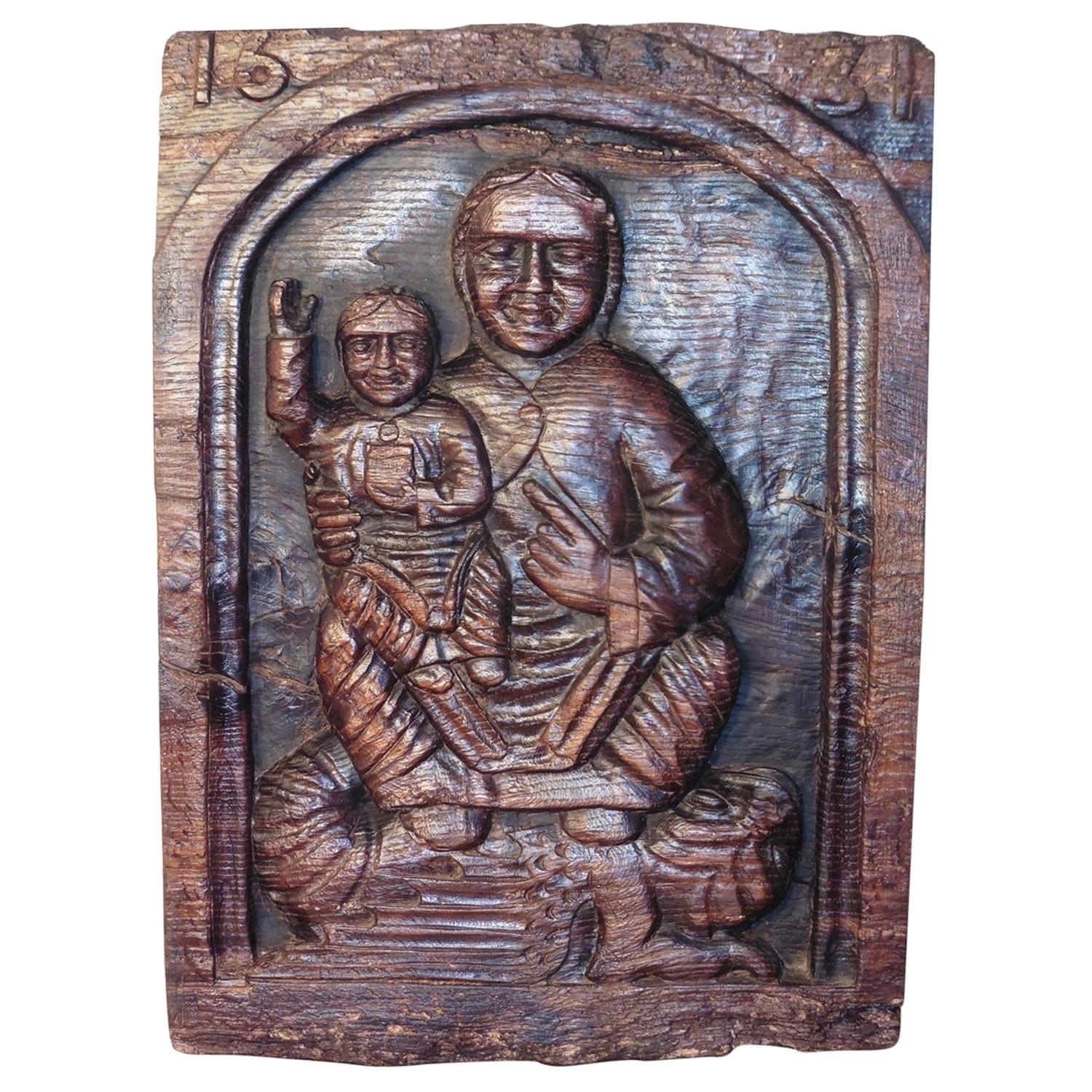 Panneau religieux primitif du 17ème siècle en chêne sculpté 1631