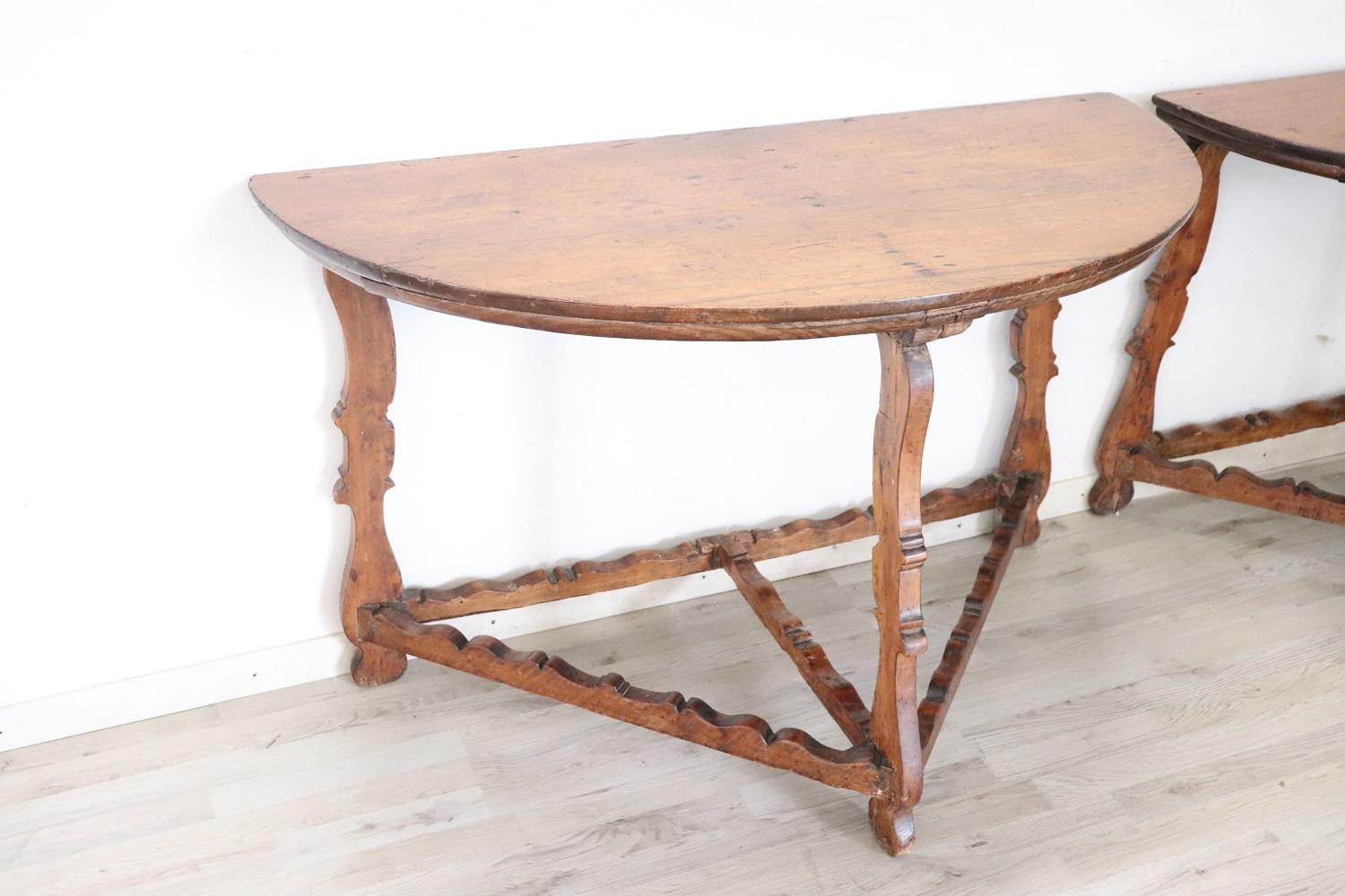 Important antique solid walnut pair of console table 1680s. Walnut wood has acquired a beautiful antique patina presenting the signs of all the past centuries. The signs of the passage of time on this console table top are a merit that certify its