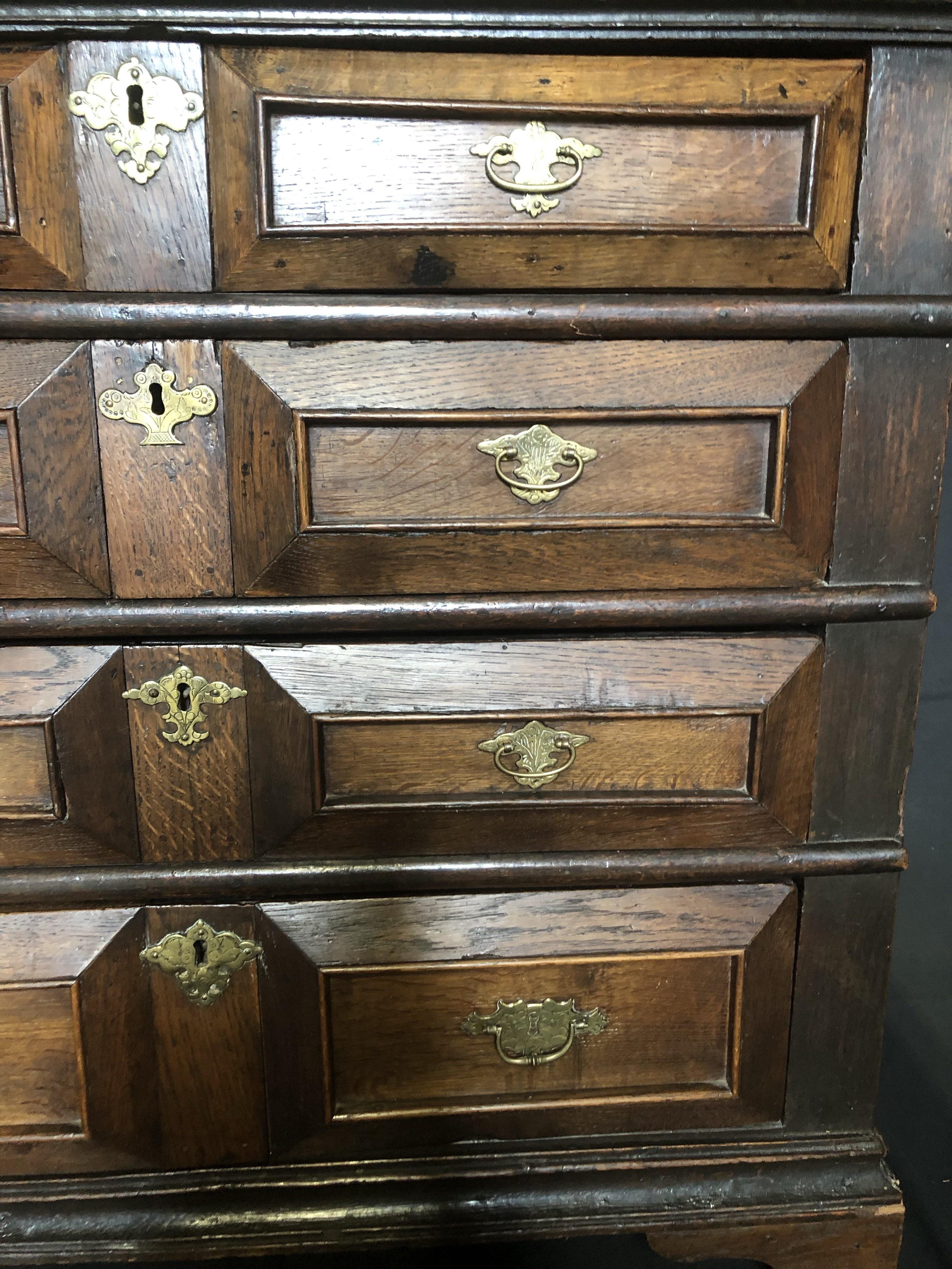Stunning super early, beautifully proportioned antique chest of drawers with fabulous original hardware. Bought in the North of England, this oak chest is circa 1670.
#3351.


   