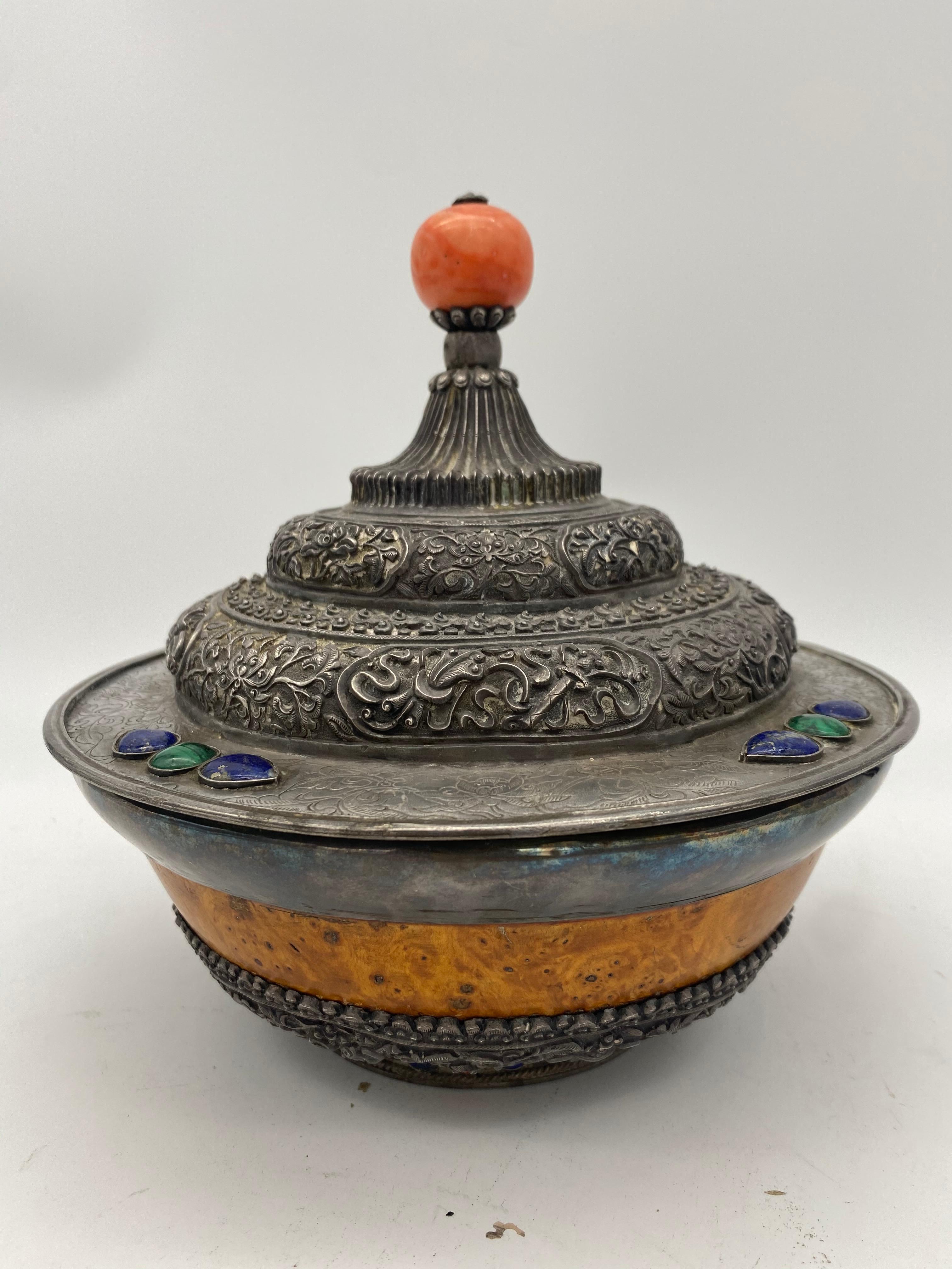 17th century rare Tibetan silver mounted brul covered bowl with coral bottom, the repousse and domed cover inset with Cora and lapis, big 3cm diameter red coral bottom, some tarnish, lacking in lapis jewel, measures: diameter 7.75 inch x 8 inch