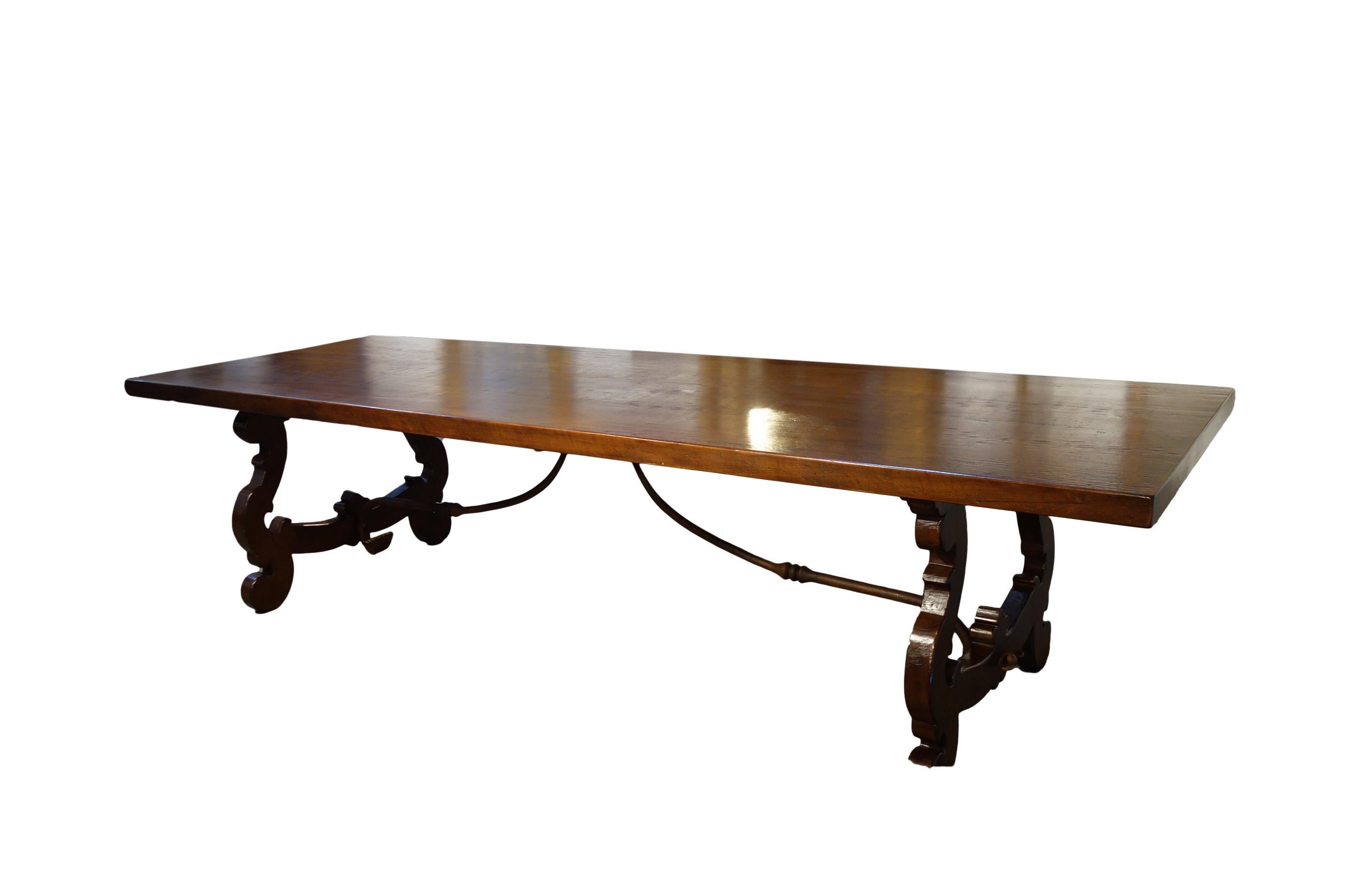 Our classic Lira Style dining table expands with extension leaves inserted in the table ends, offering an option for entertainment seating: Old Walnut Refectory table with lyre-shaped bases, handcrafted in aged Italian walnut, shown in Espresso Dark