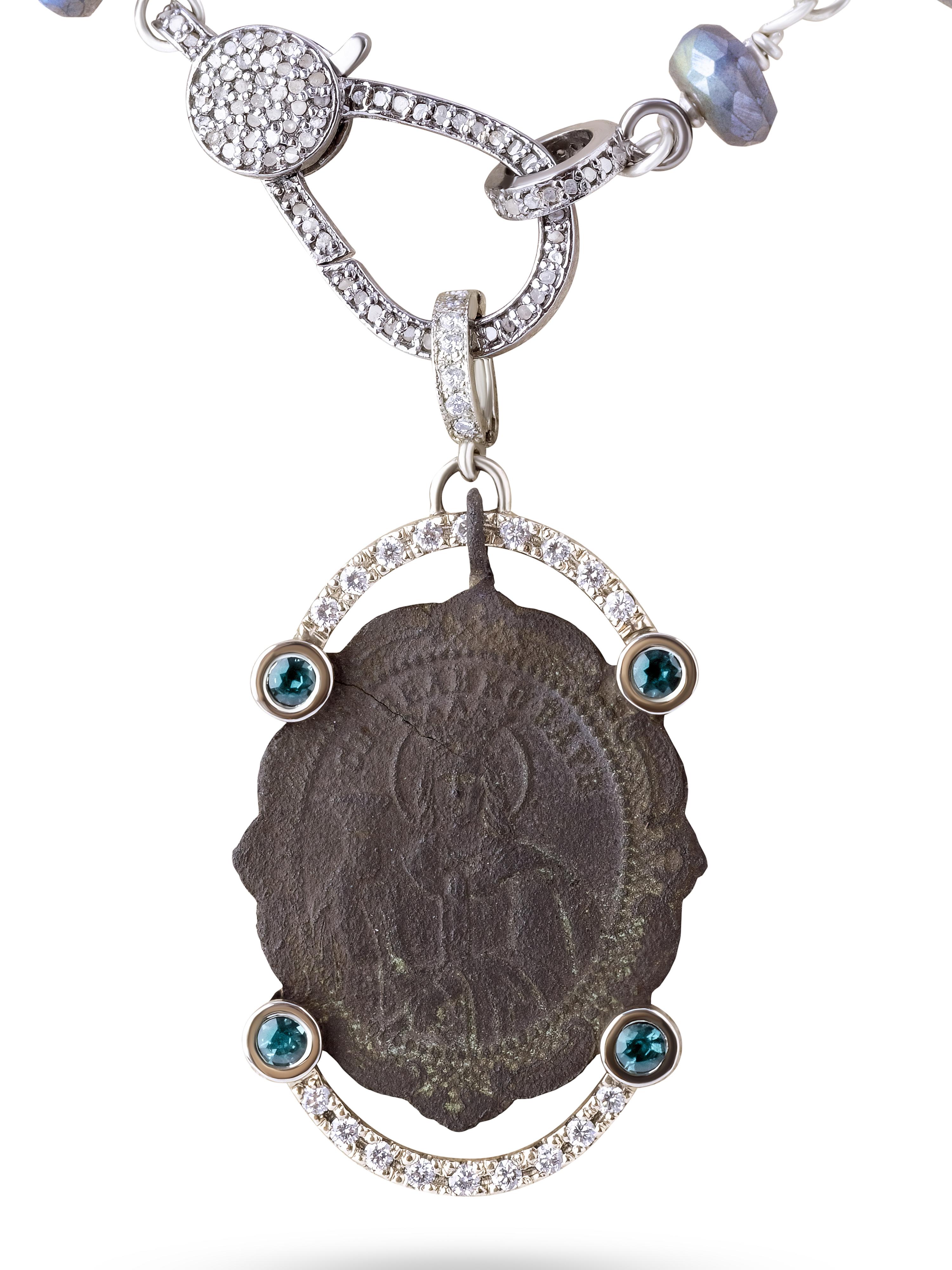 The Revival Collection 
17th Century Russian Orthodox Medal Pendant
Accented with handmade bezel featuring diamond arches 
14K White Gold 
4 Bezel Set Genuine Russian Alexandrite.  
29 Labradorite faceted disc beads 
and hand twisted Sterling Silver