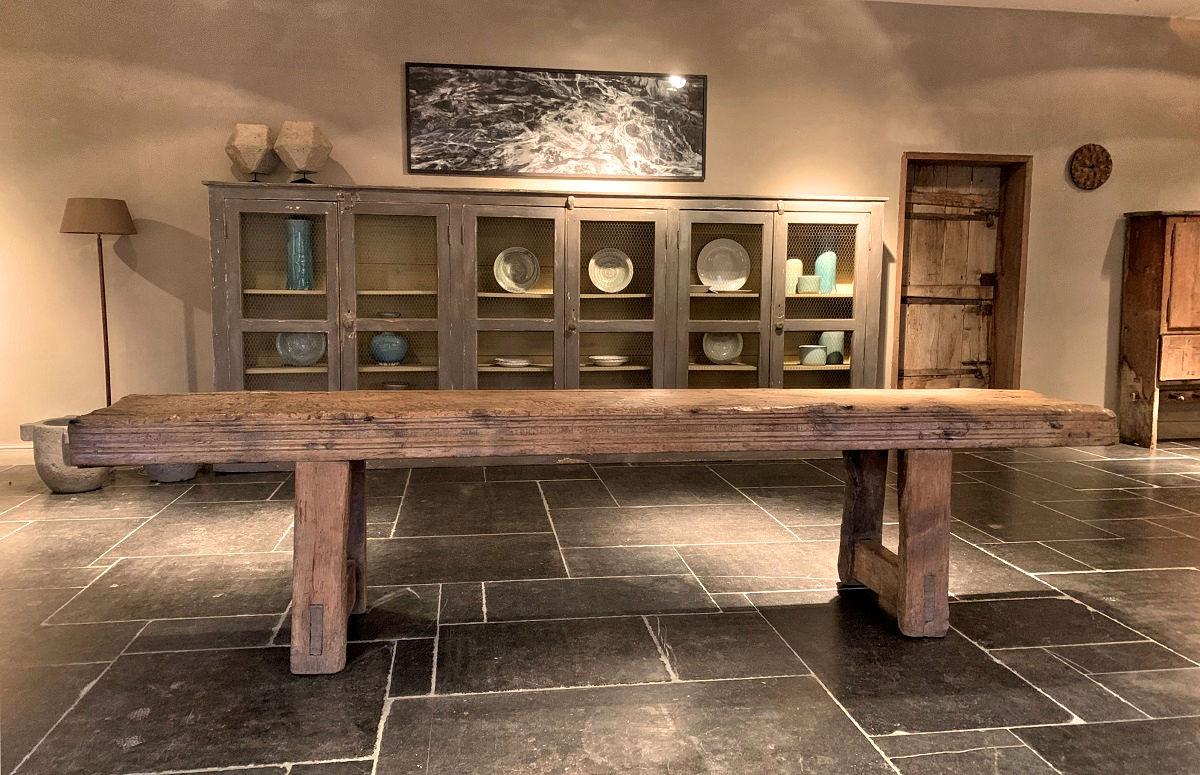A very large 17th century mountain pine console table. Most possibly in origin a serving table and later used a work table in a monastery or castle. Great sturdy proportions with a nice moulding in front. Throughout the table the original wooden