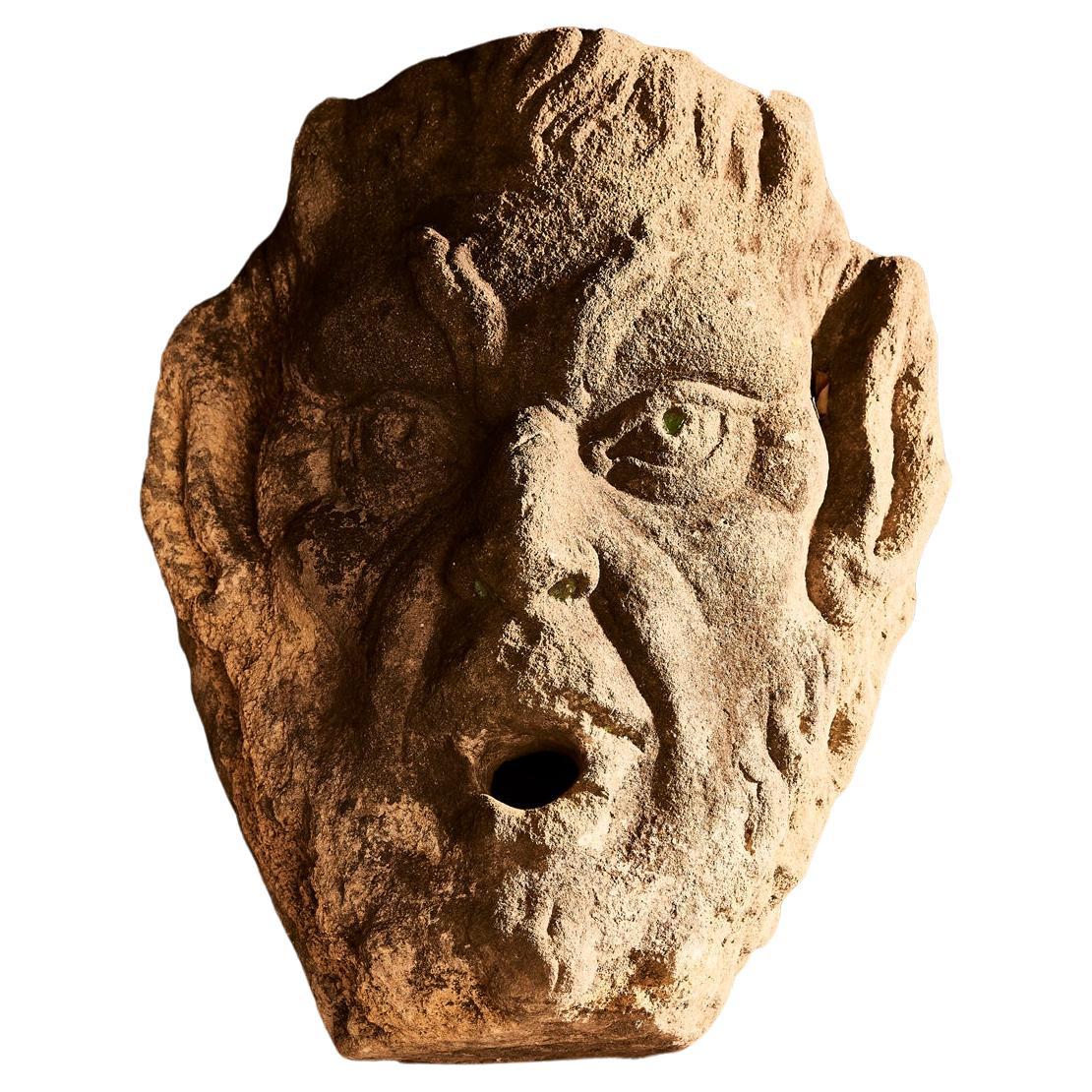 17th Century - Serene stone mascaron  For Sale