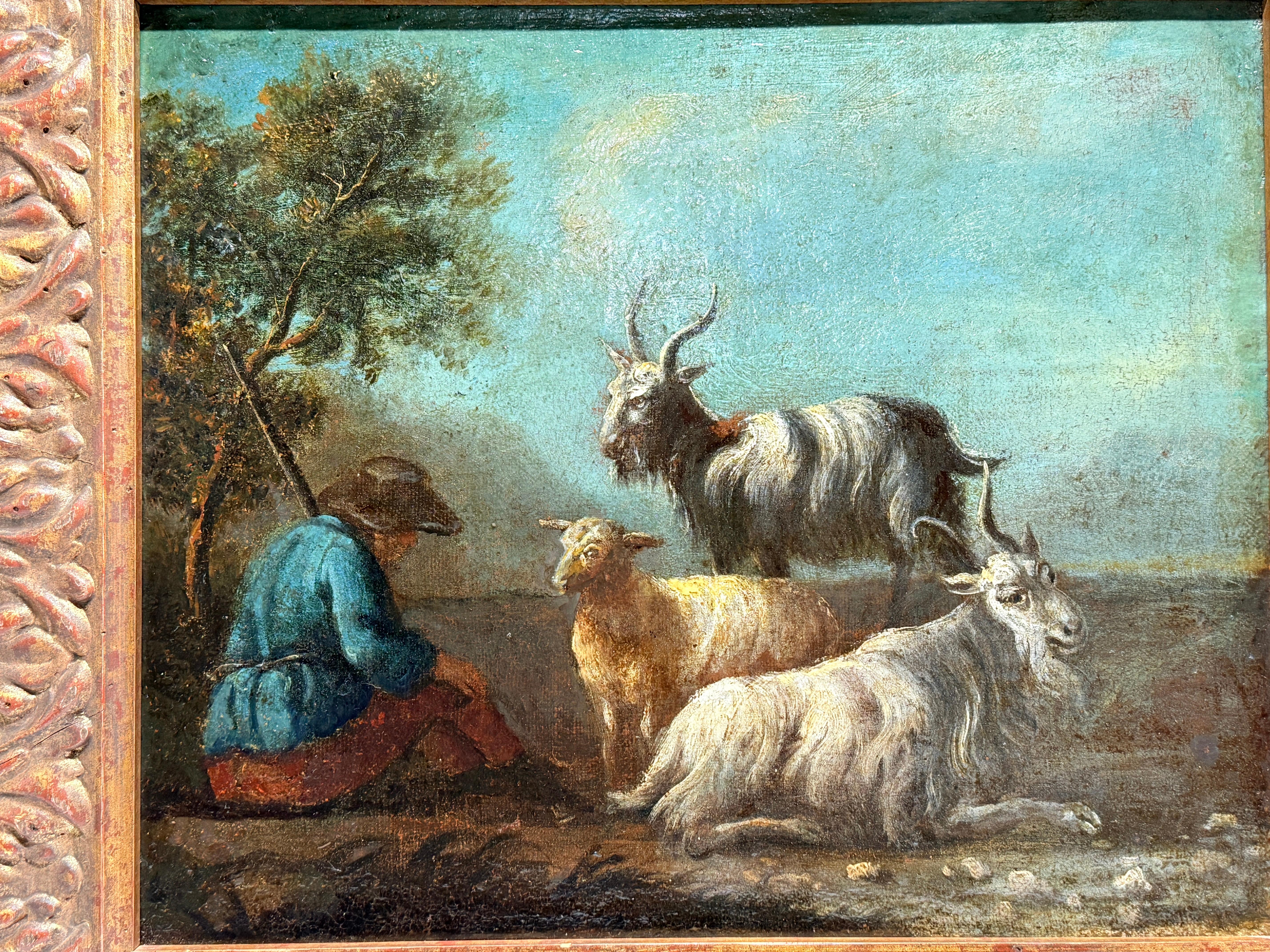 Questo squisito dipinto a olio è una magistrale rappresentazione di una scena pastorale che incarna la serena bellezza della vita rurale. Realizzata probabilmente nel XVII secolo, l'opera è sicuramente di origine fiamminga, rinomata per la sua ricca