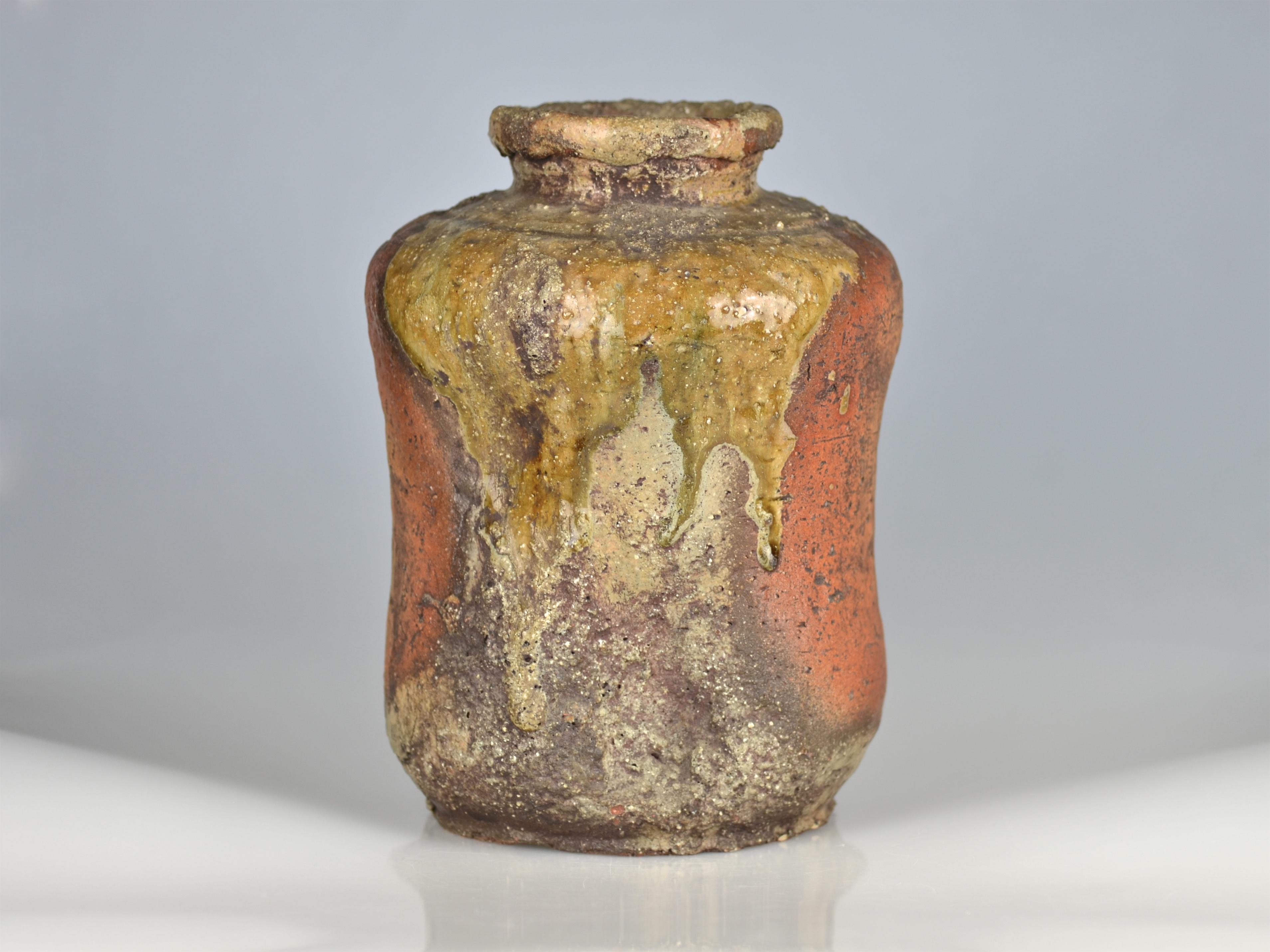 Fantastic early Edo-period storage jar. With its sharp-angled shoulders and almost vertical sides this jar is a typical 