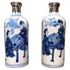 17th century silver mounted Delft vases with decor of Chinese figures playing Go