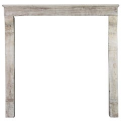 17th Century Small French Country Limestone Antique Fireplace Surround