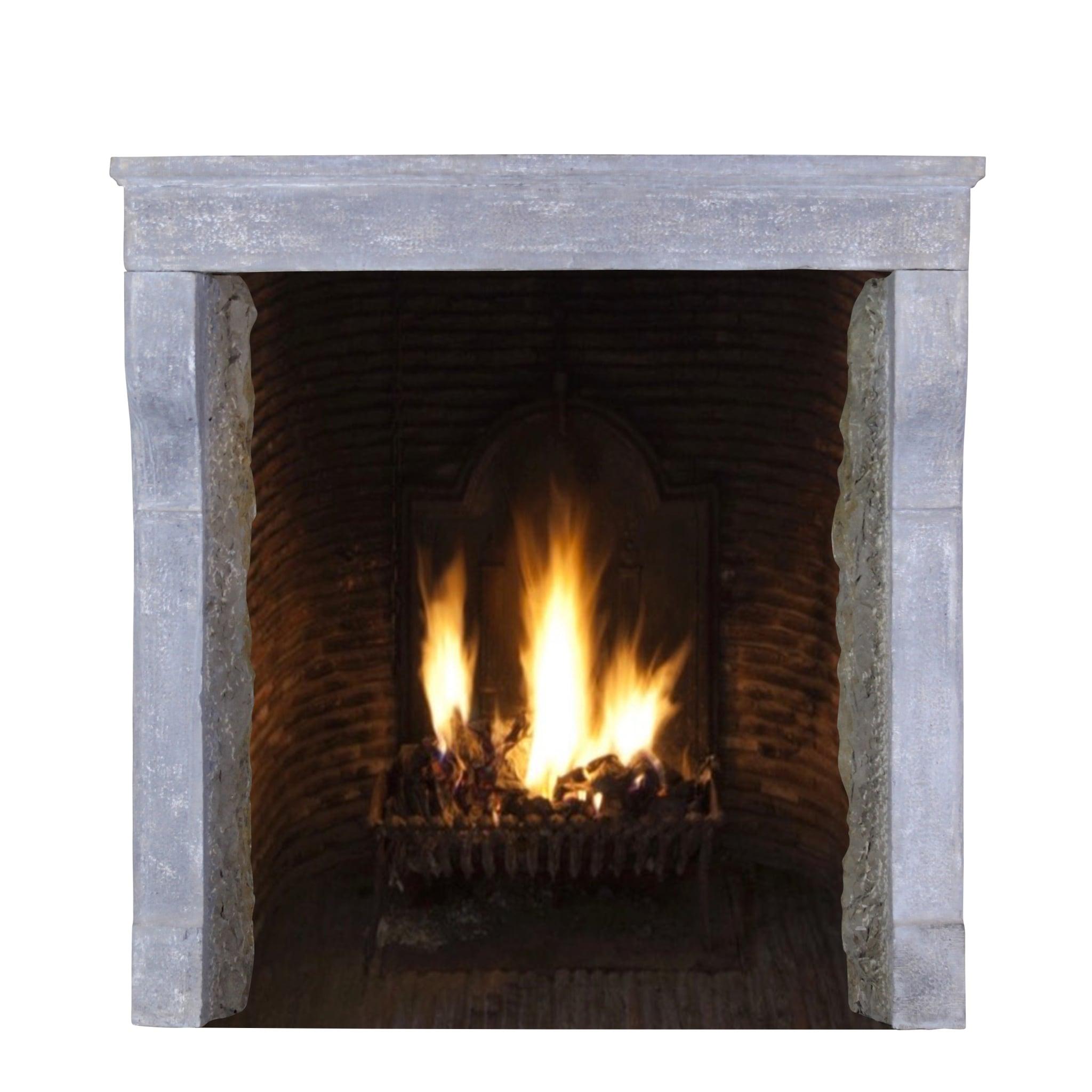 Louis XIII 17th Century Small French Rustic Limestone Antique Fireplace Surround For Sale