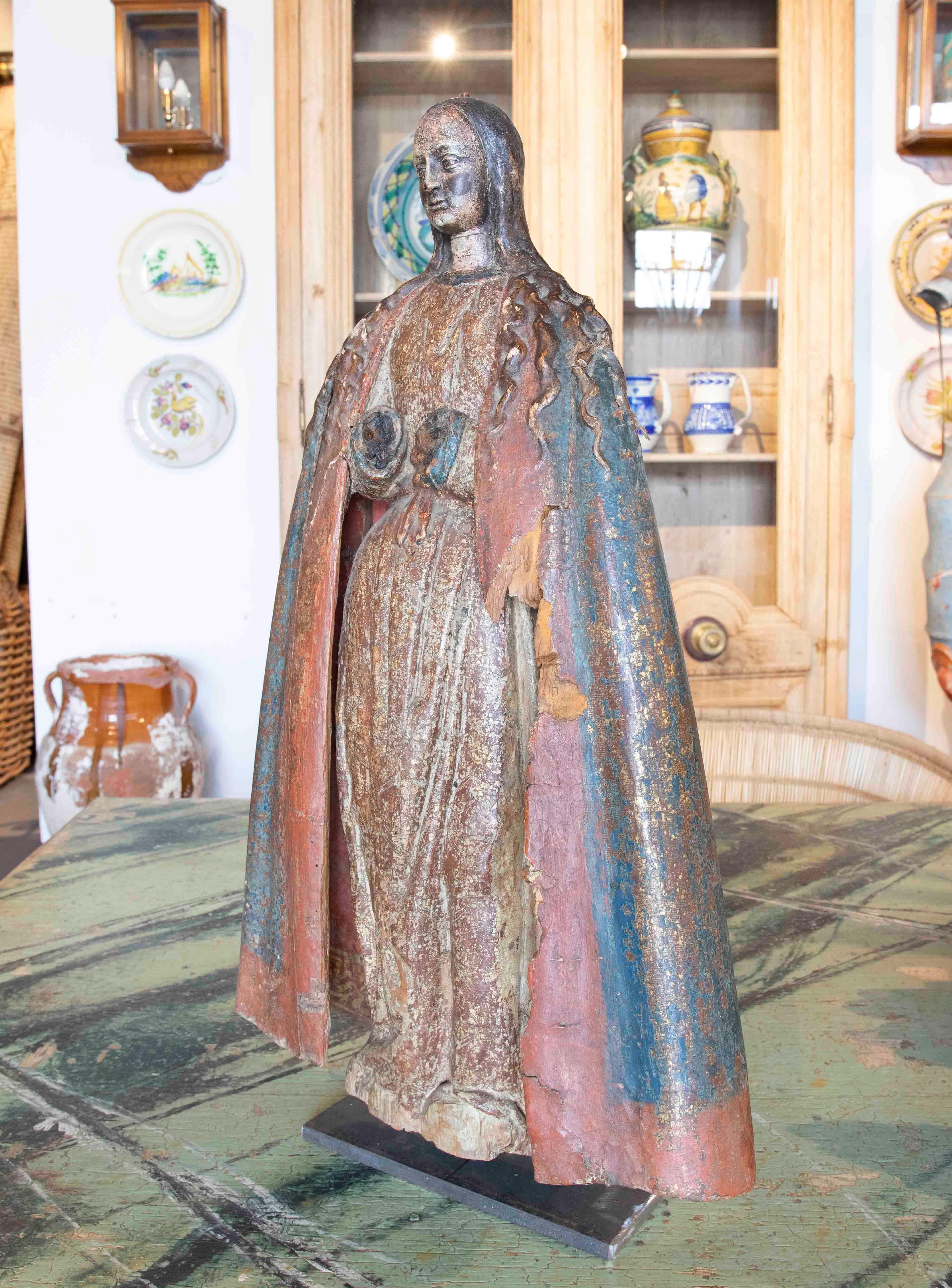17th century Spanish Polychromed Wooden Carved Sculpture of a Virgin Mary.