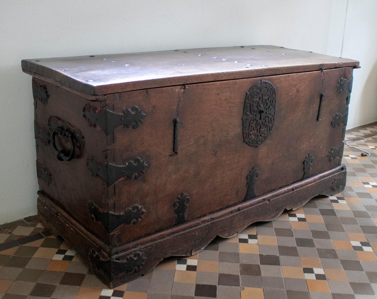 17th century Spanish walnut chest with original iron fittings.
    