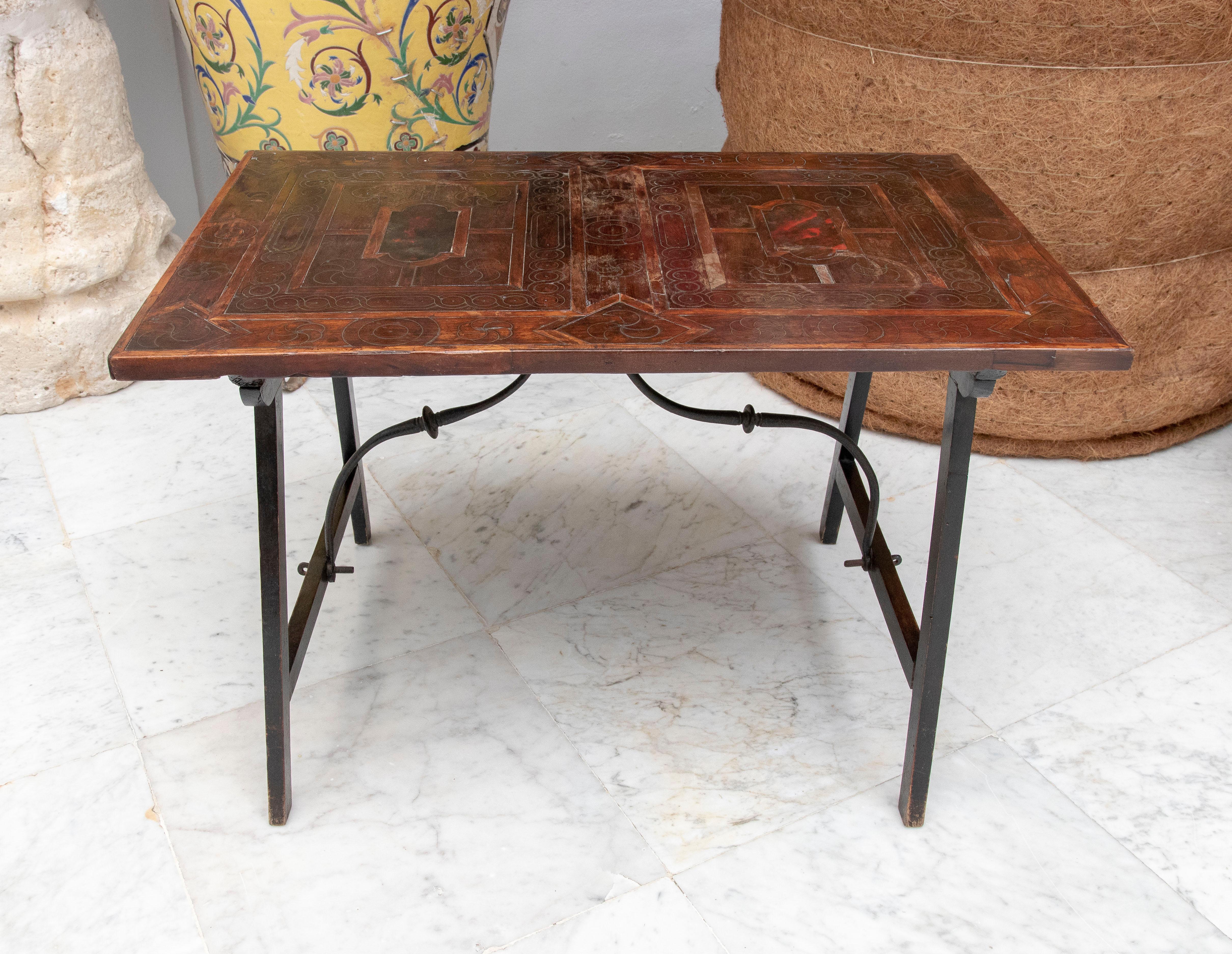17th century Spanish wooden table with inlays.