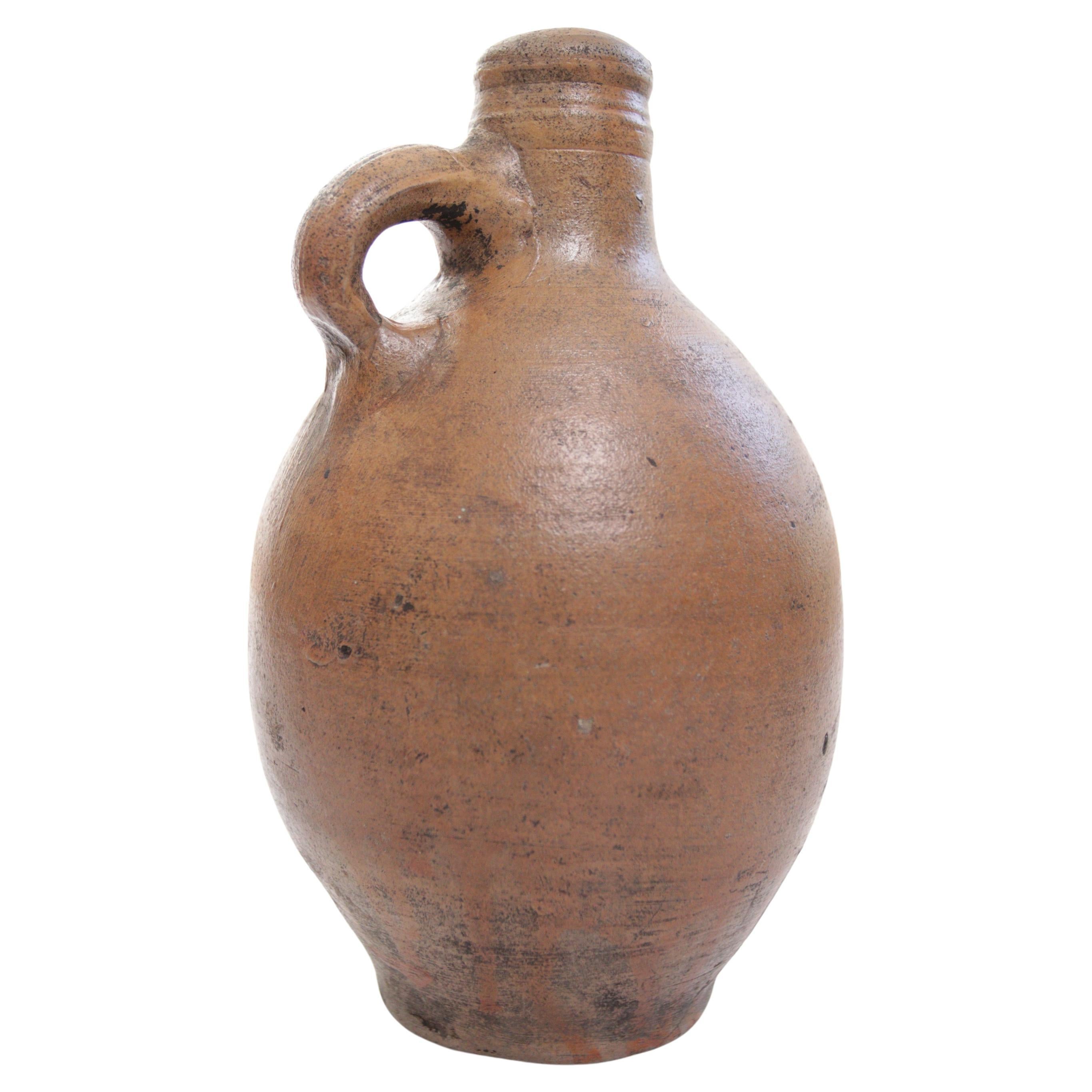 Wonderful stoneware Jug from the 17th century.
In good condition.

A perfect item for the Wabi Sabi, Natural looking interiors.