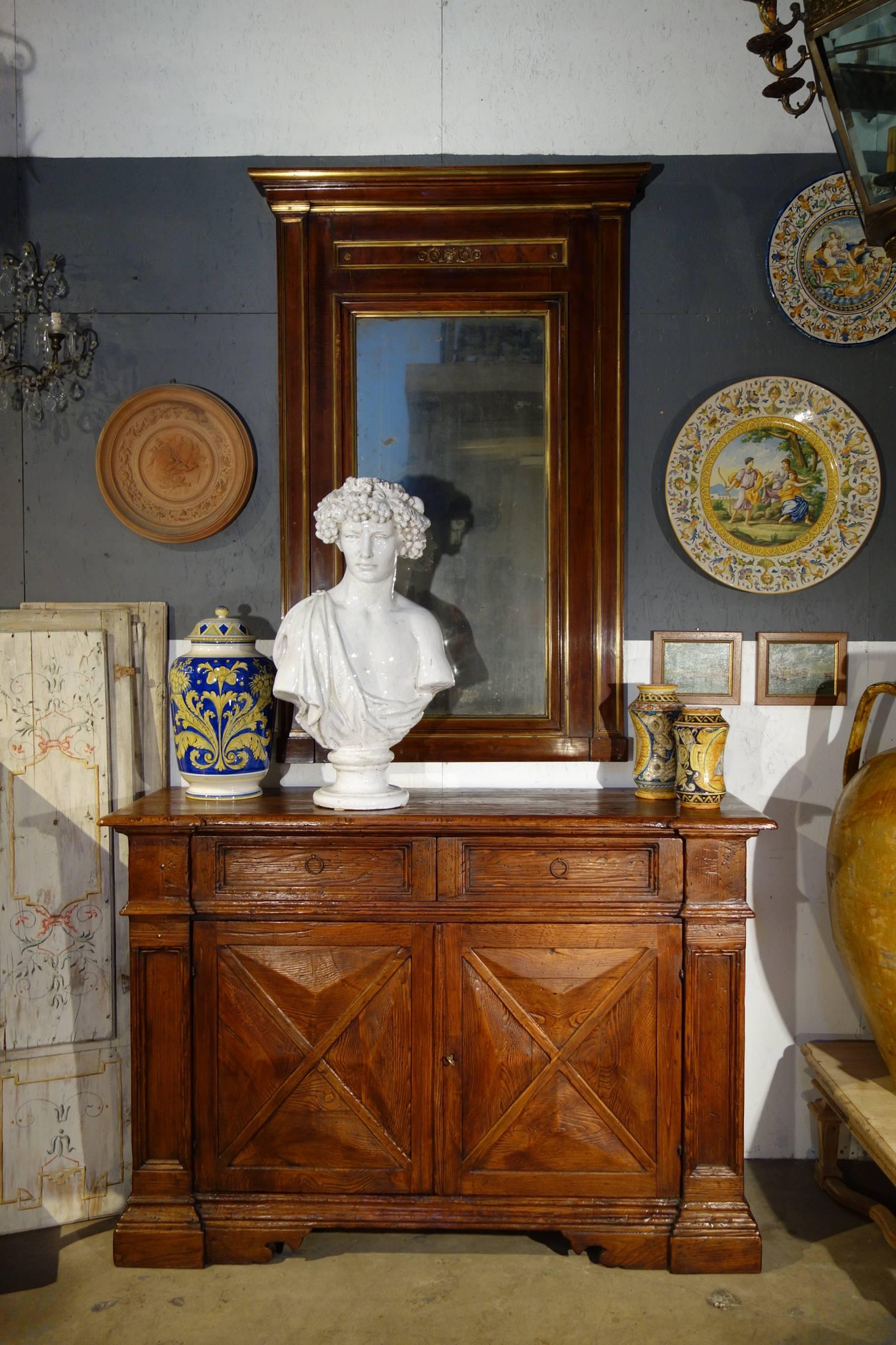 Our 17th century style “AREZZO Grande” credenza - The Italian Art & Handcraft of Fine Antique Reproduction

The Arezzo Grande Old Chestnut credenza features 2 doors + 2 drawers, handcrafted in Italian aged chestnut solid hardwoods brushed to