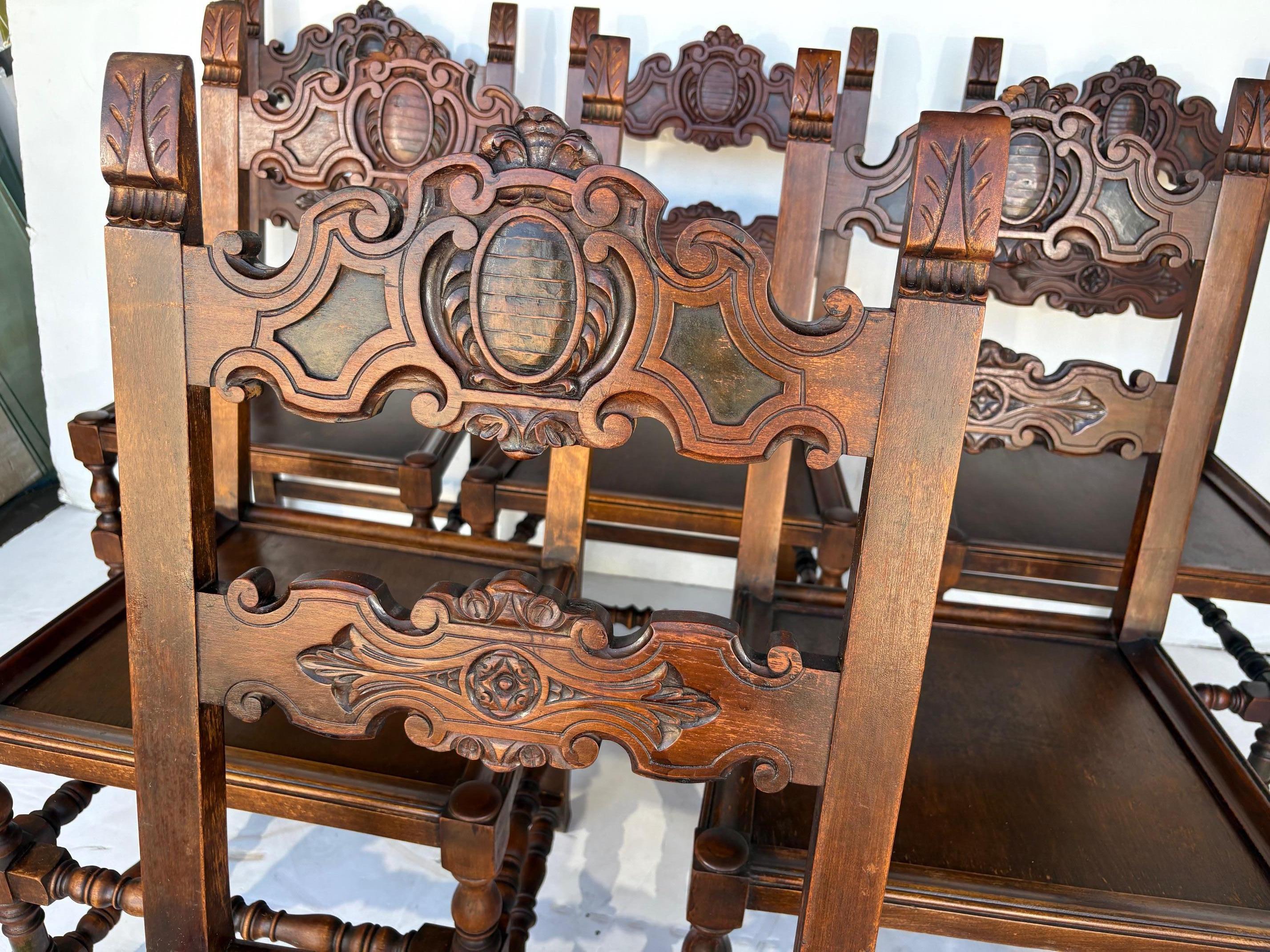 A set of 6 English style Dining Chairs in the 17th century style. Carved back splat and top rail. Finely turned legs and stretchers.