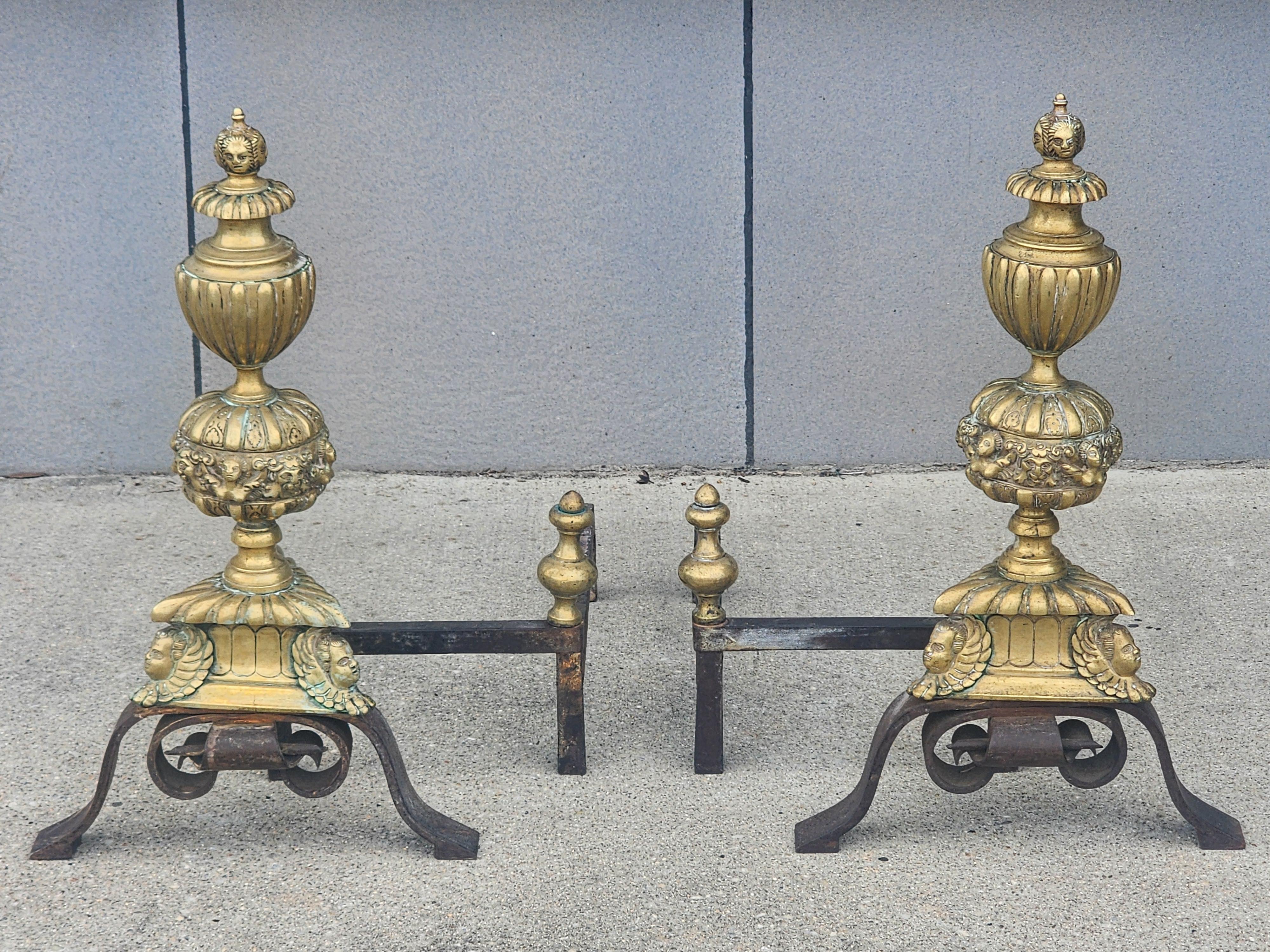 Pair of stunning 17th century Baroque style andirons made in the mid 19th century in Belgium.   Stunning details and scale with a timeless look to them that could be placed in nearly any interior.   The detailed faces on the. Remind me of the work